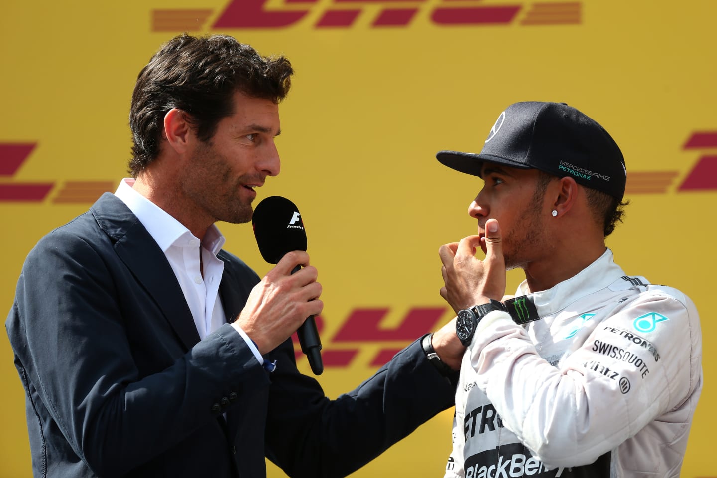 SPIELBERG, AUSTRIA - JUNE 22:  Lewis Hamilton of Great Britain and Mercedes GP speaks with former