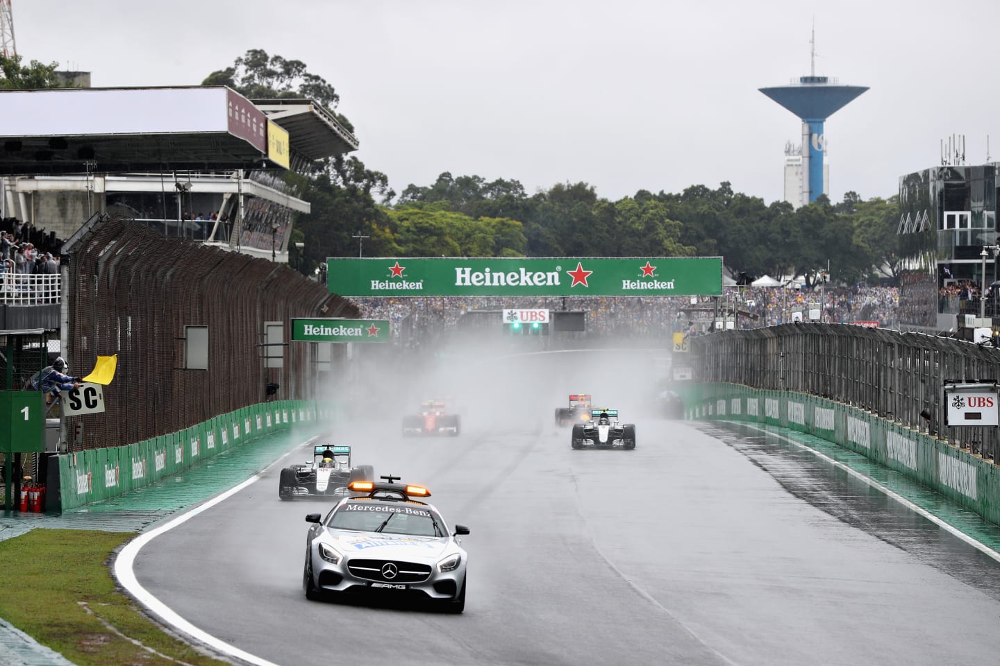 SAO PAULO, BRAZIL - NOVEMBER 13:  The safety car leads the way at the start in wet conditions