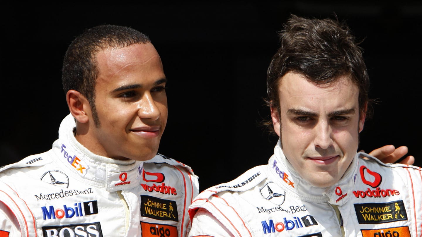 Spanish McLaren-Mercedes driver Fernando Alonso (R) and British McLaren-Mercedes driver Lewis