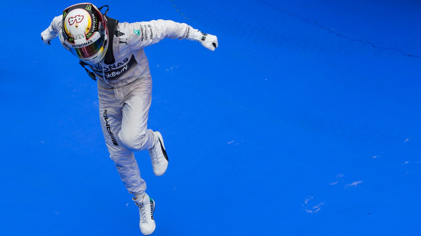 KUALA LUMPUR, MALAYSIA - MARCH 30:  Lewis Hamilton of Mercedes and Great Britain wins The Malaysian