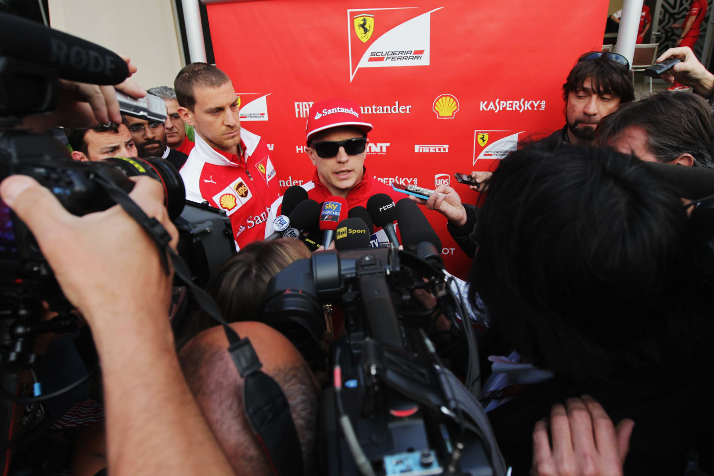 BAHRAIN, BAHRAIN - FEBRUARY 22:  Kimi Raikkonen of Finland and Ferrari talks at the drivers