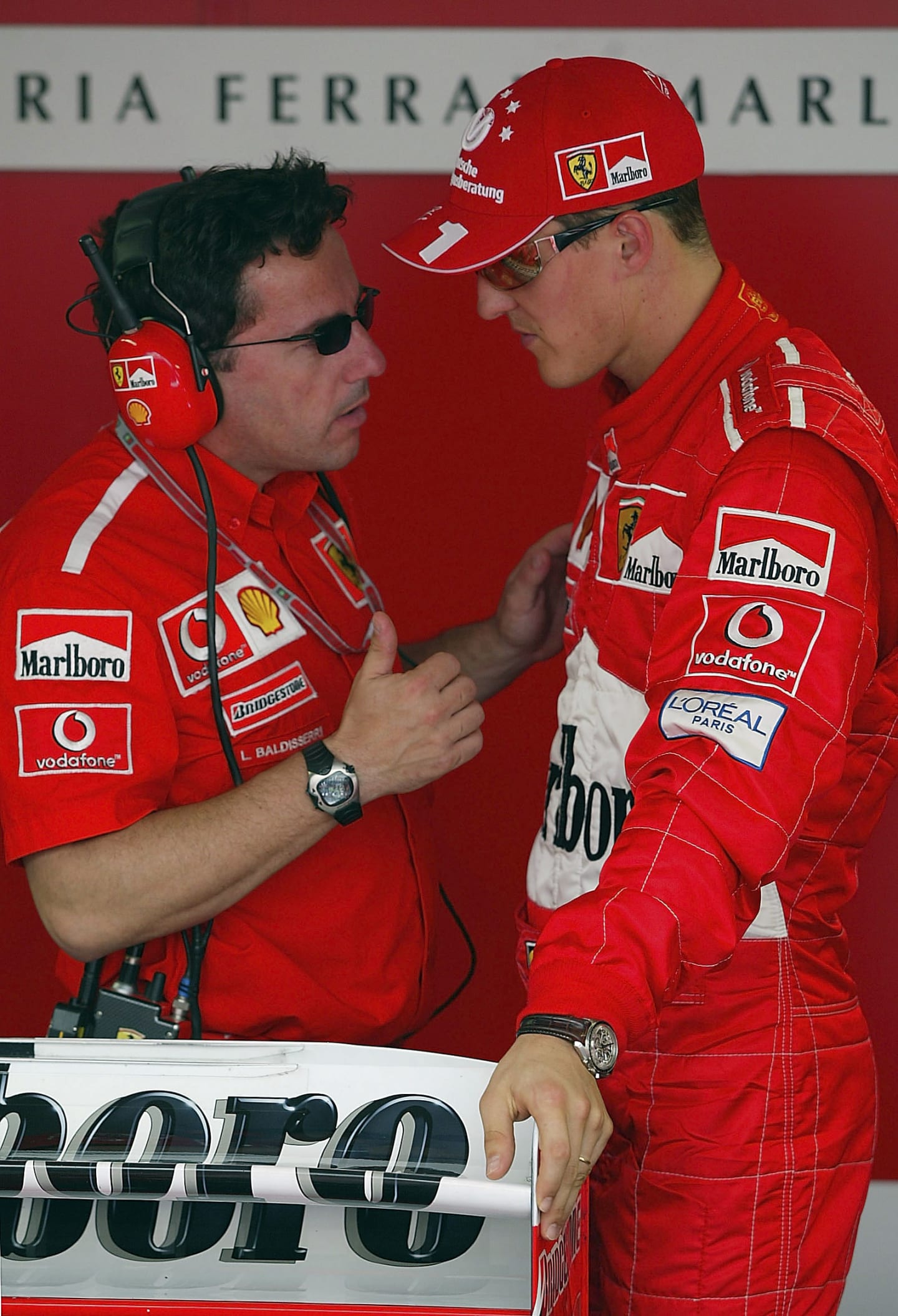 MONACO - MAY 31:  Michael Schumacher of Germany and Ferrari chats to race engineer Luca Baldisserri