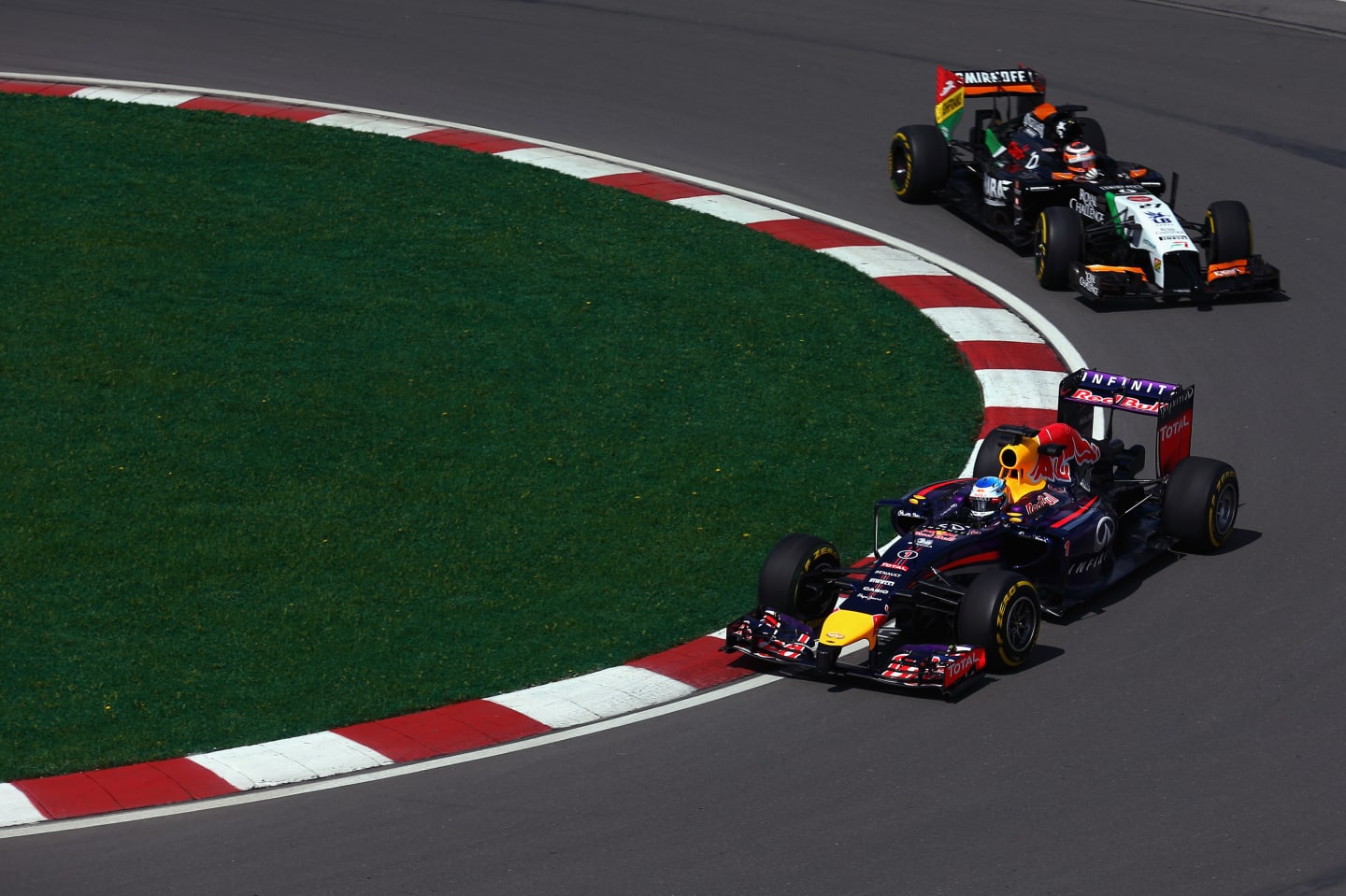 MONTREAL, QC - JUNE 06:  Sebastian Vettel of Germany and Infiniti Red Bull Racing and Nico