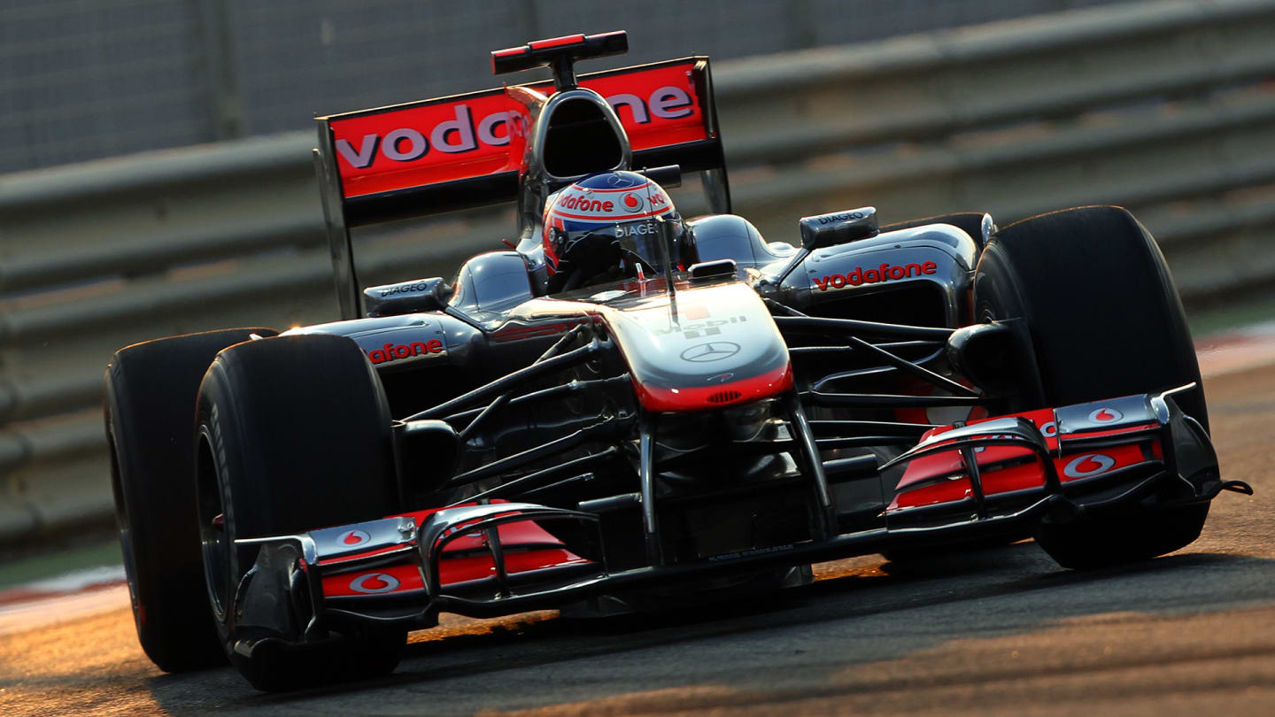 McLaren Mercedes' British driver Jenson Button drives at the Yas Marina circuit on November 13,
