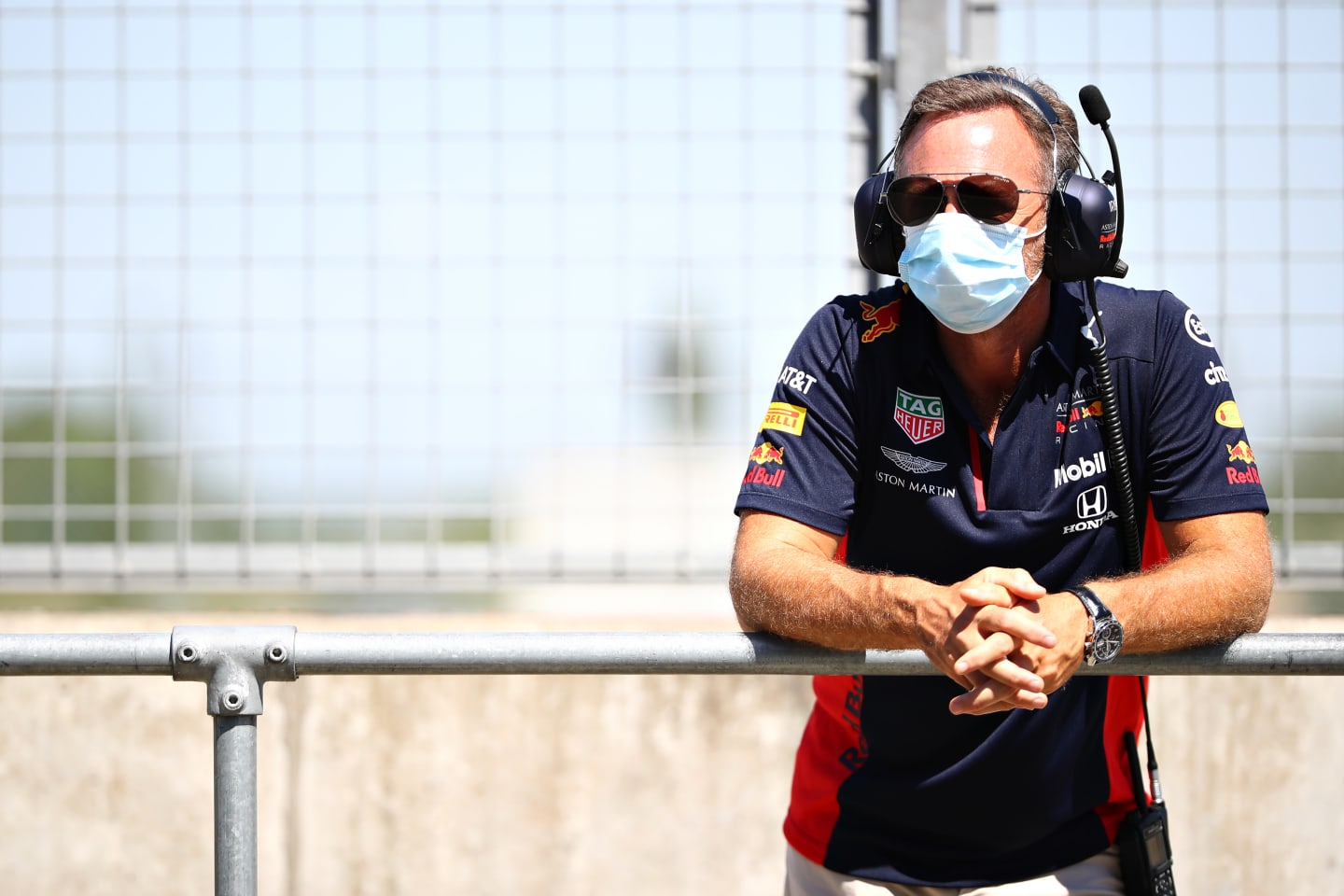 Red Bull Racing Team Principal Christian Horner looks on in the pitlane during the filming day
