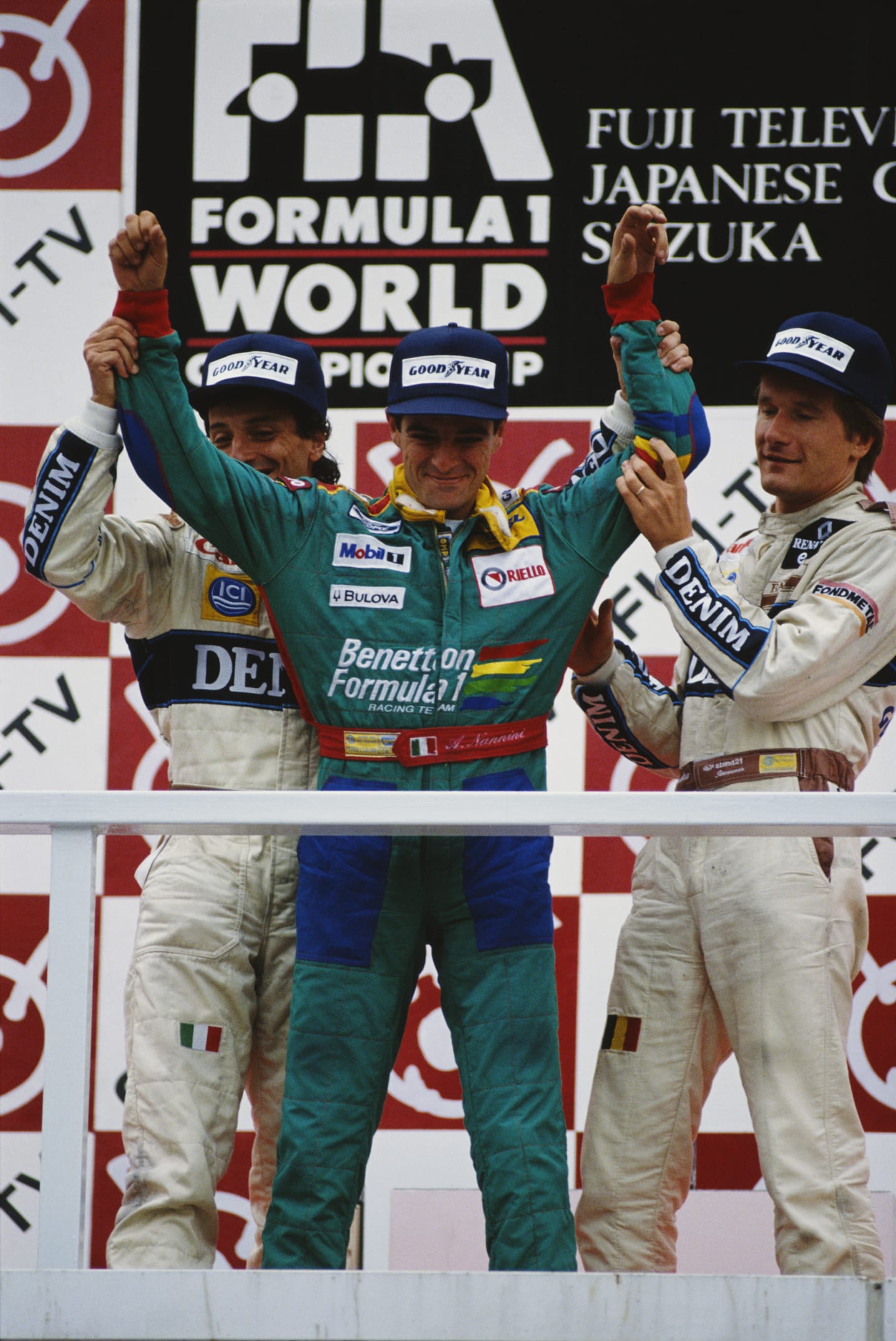 Alessandro Nannini of Italy (C) and driver of the #19 Benetton Formula Ltd Benetton B189 Ford