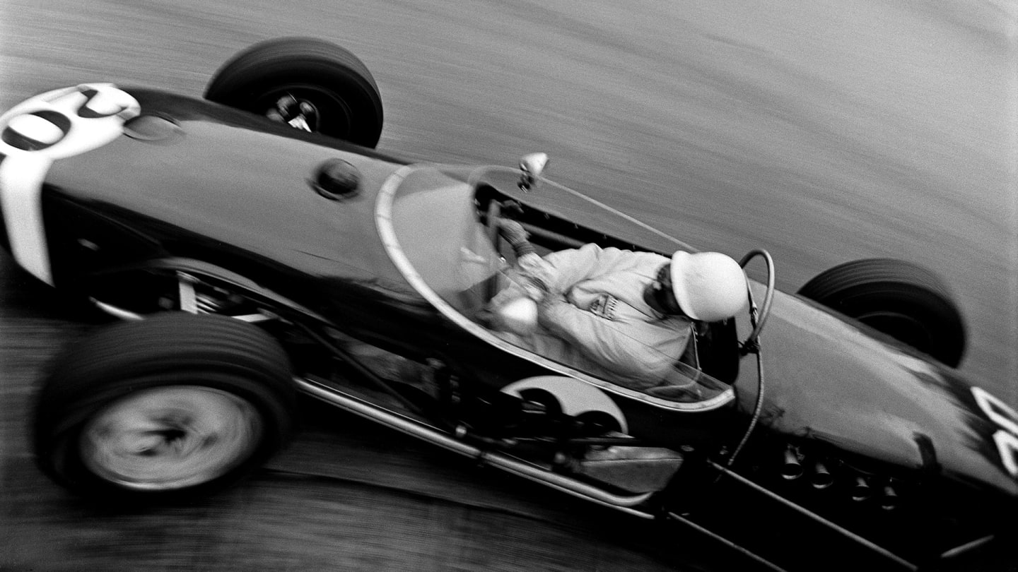 The Monaco Grand Prix; Monte Carlo, May 14,  1961.  Stirling Moss rounds the old Station Hairpin,