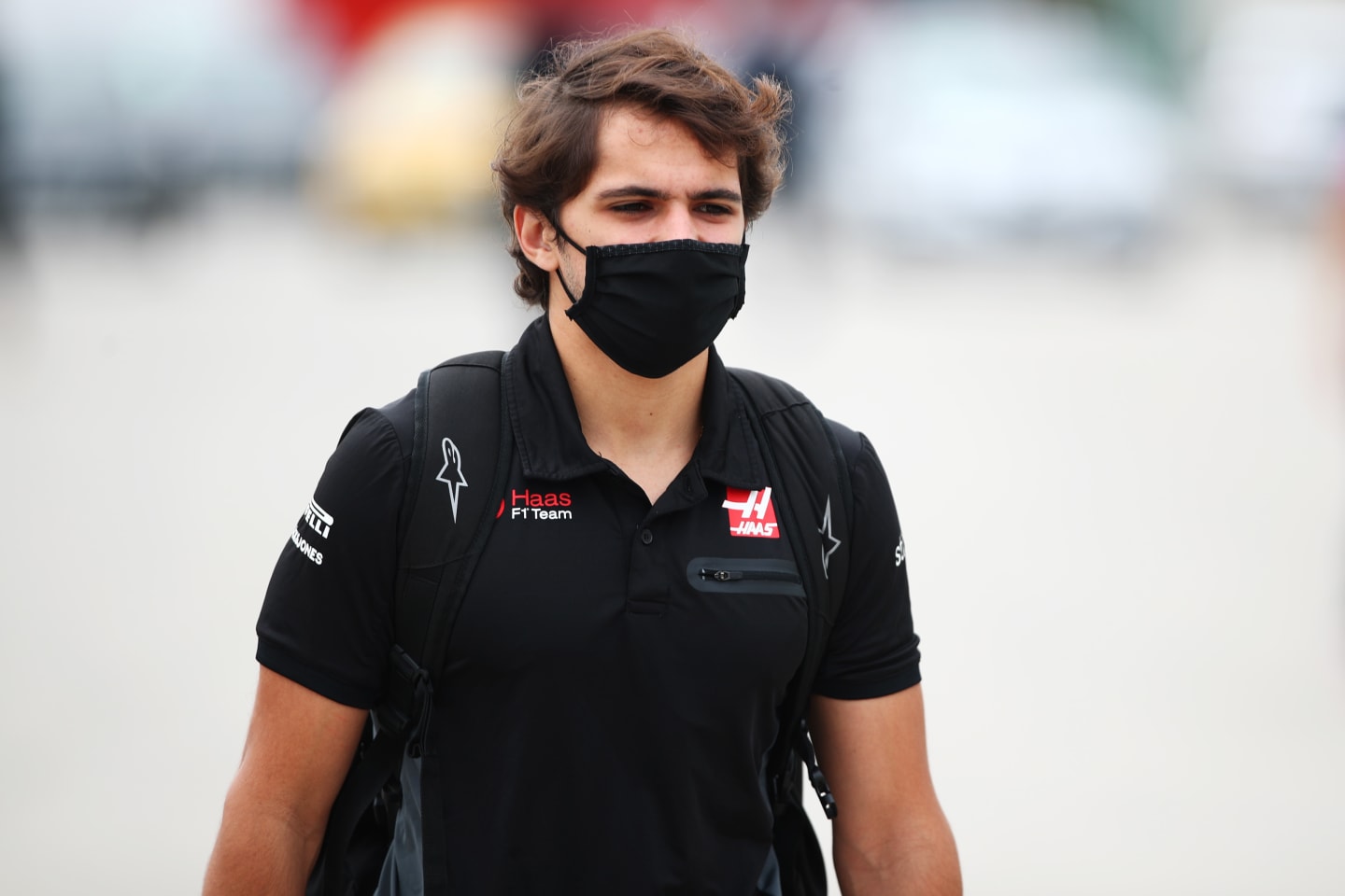 PORTIMAO, PORTUGAL - OCTOBER 25: Pietro Fittipaldi of Brazil and Haas F1 walks in the Paddock