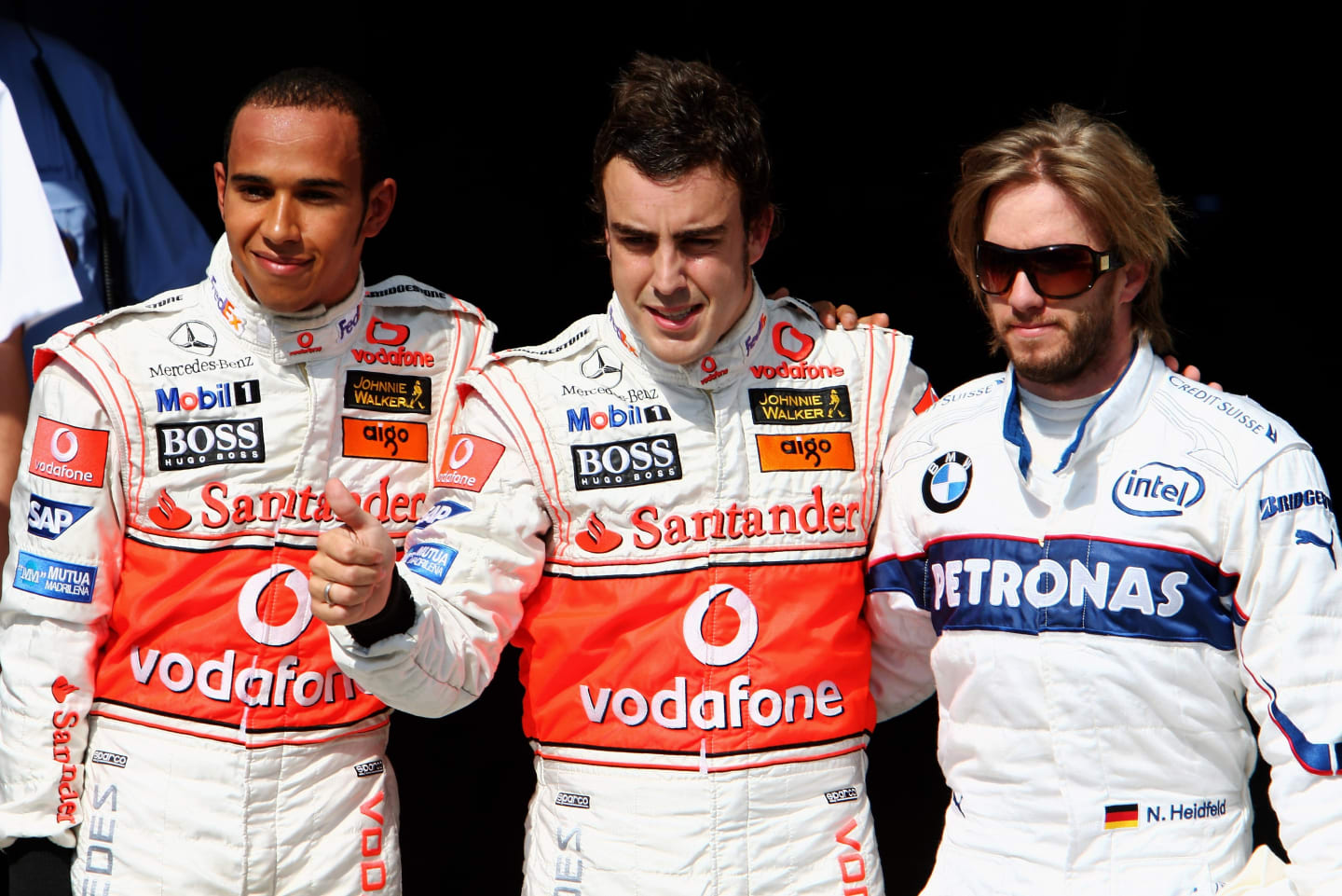 BUDAPEST, HUNGARY - AUGUST 04:  Fernando Alonso (C)  of Spain and Lewis Hamilton (L) of Great