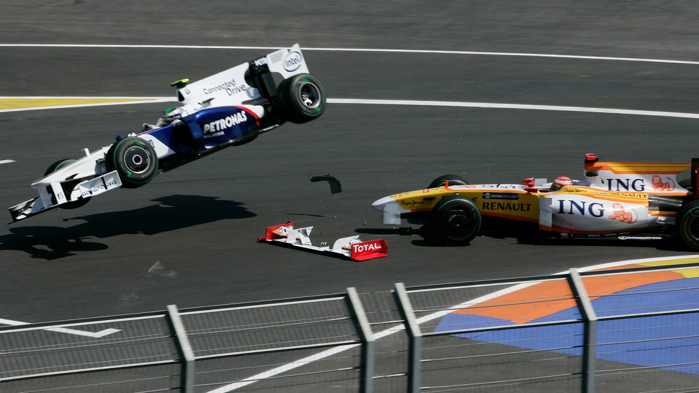 VALENCIA, SPAIN - AUGUST 21:  Nick Heidfeld (L) of Germany and BMW Sauber collides with Fernando