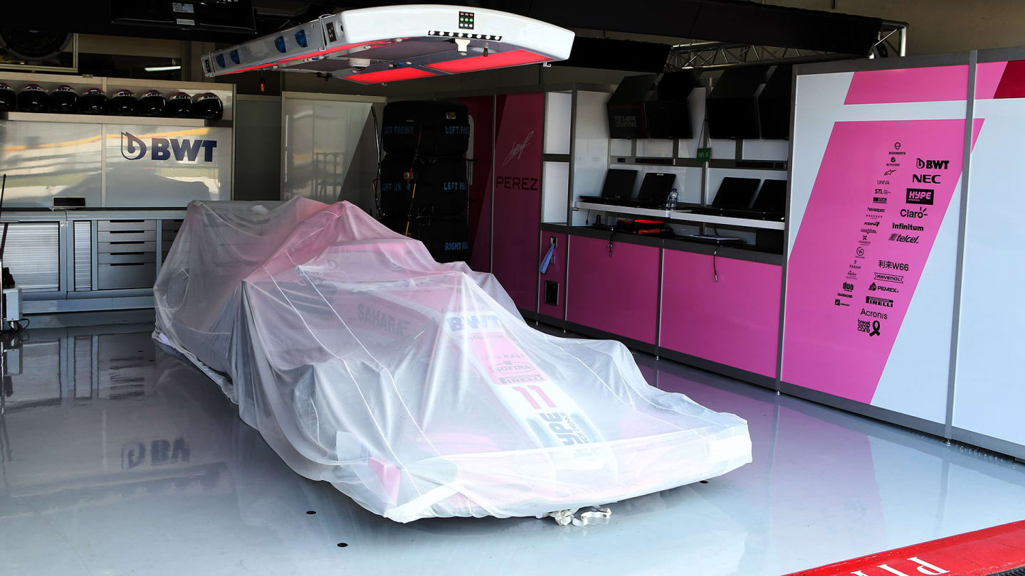 The Sahara Force India F1 VJM11 of Sergio Perez (MEX) in the pits in parc ferme