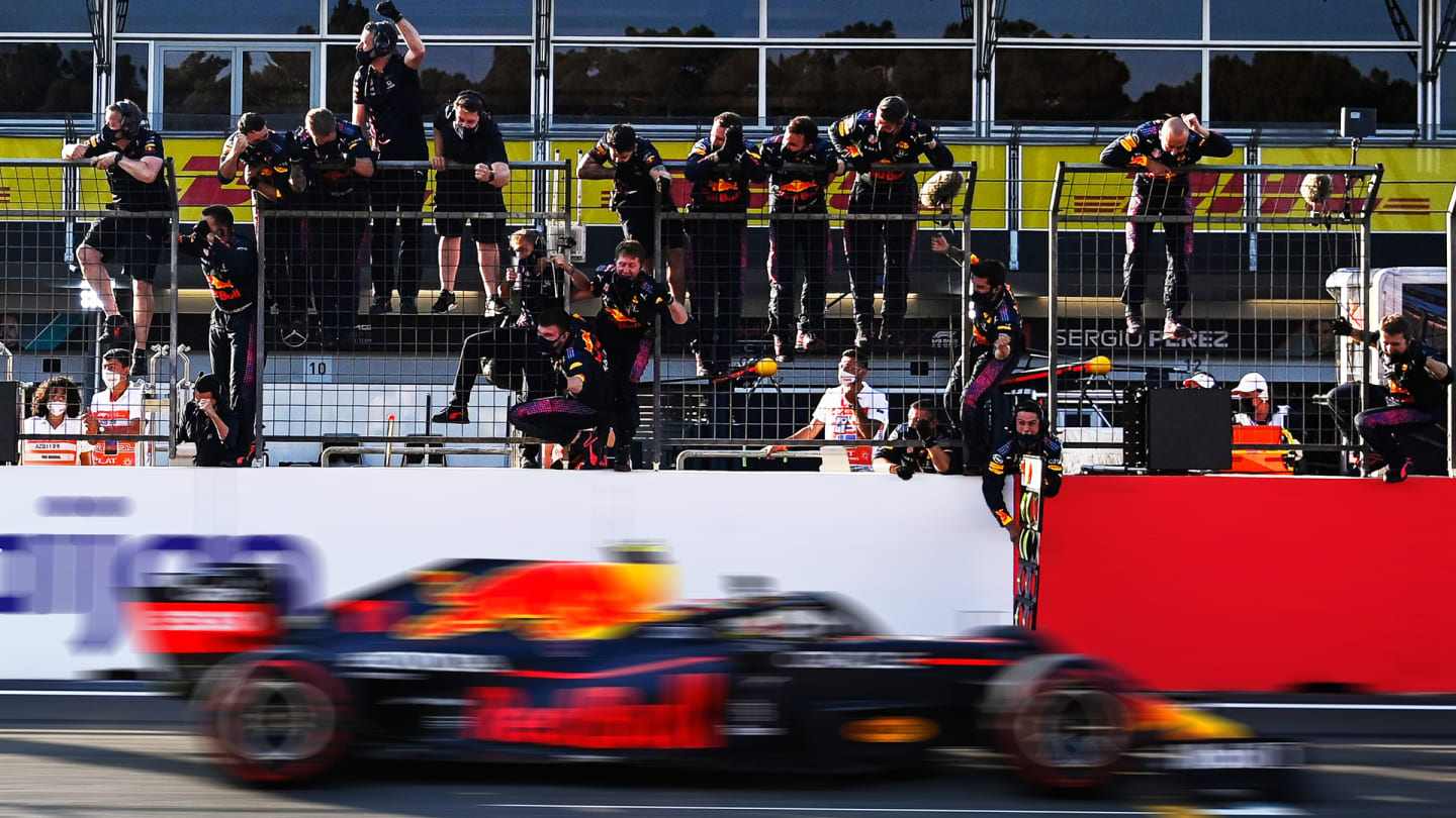 TOPSHOT - Red Bull's Mexican driver Sergio Perez wins the Formula One Azerbaijan Grand Prix at the