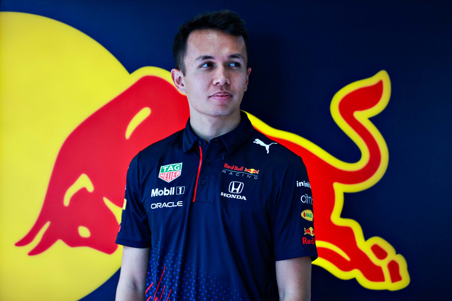 BARCELONA, SPAIN - MAY 07: Alexander Albon of Thailand and Red Bull Racing looks on in the garage