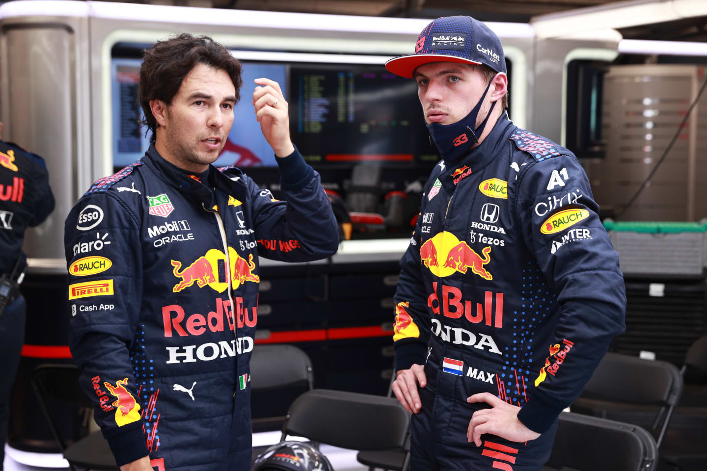 BUDAPEST, HUNGARY - AUGUST 01: Max Verstappen of Netherlands and Red Bull Racing and Sergio Perez