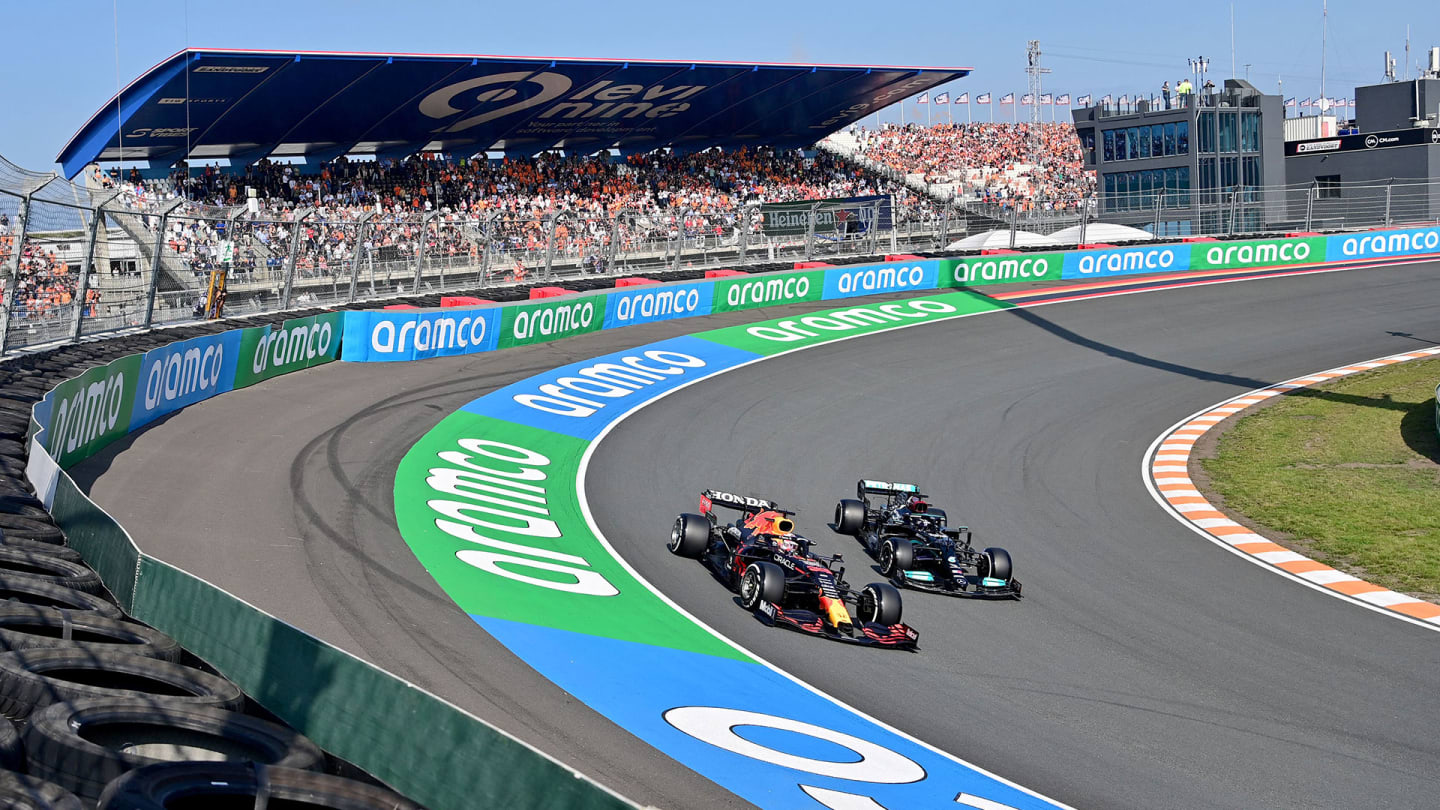 Mercedes' British driver Lewis Hamilton (R) and Red Bull's Dutch driver Max Verstappen (L) steer