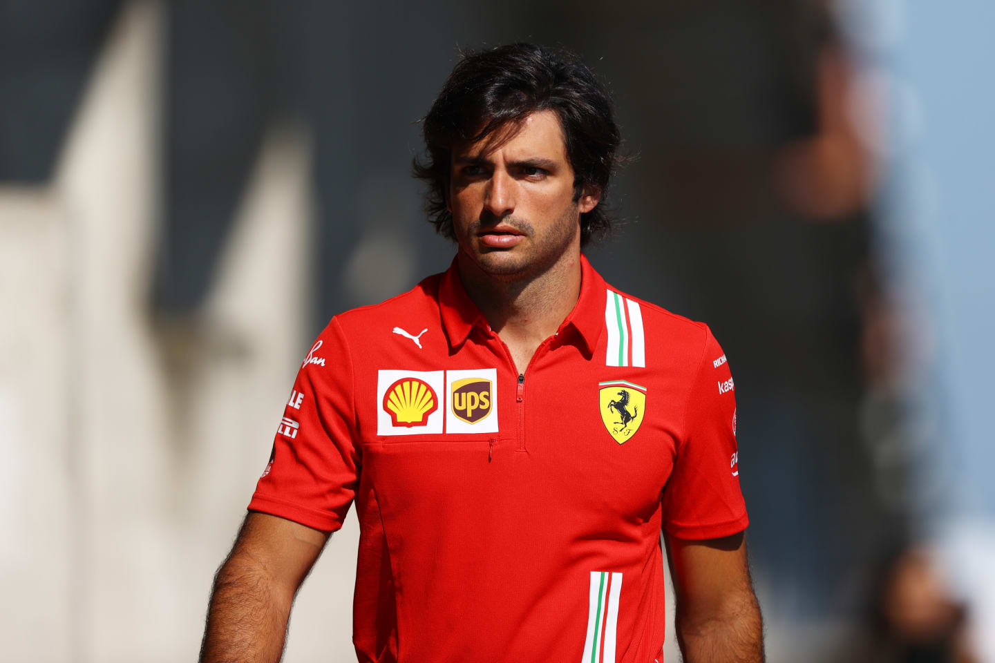 BUDAPEST, HUNGARY - JULY 30: Carlos Sainz of Spain and Ferrari walks in the Paddock before practice