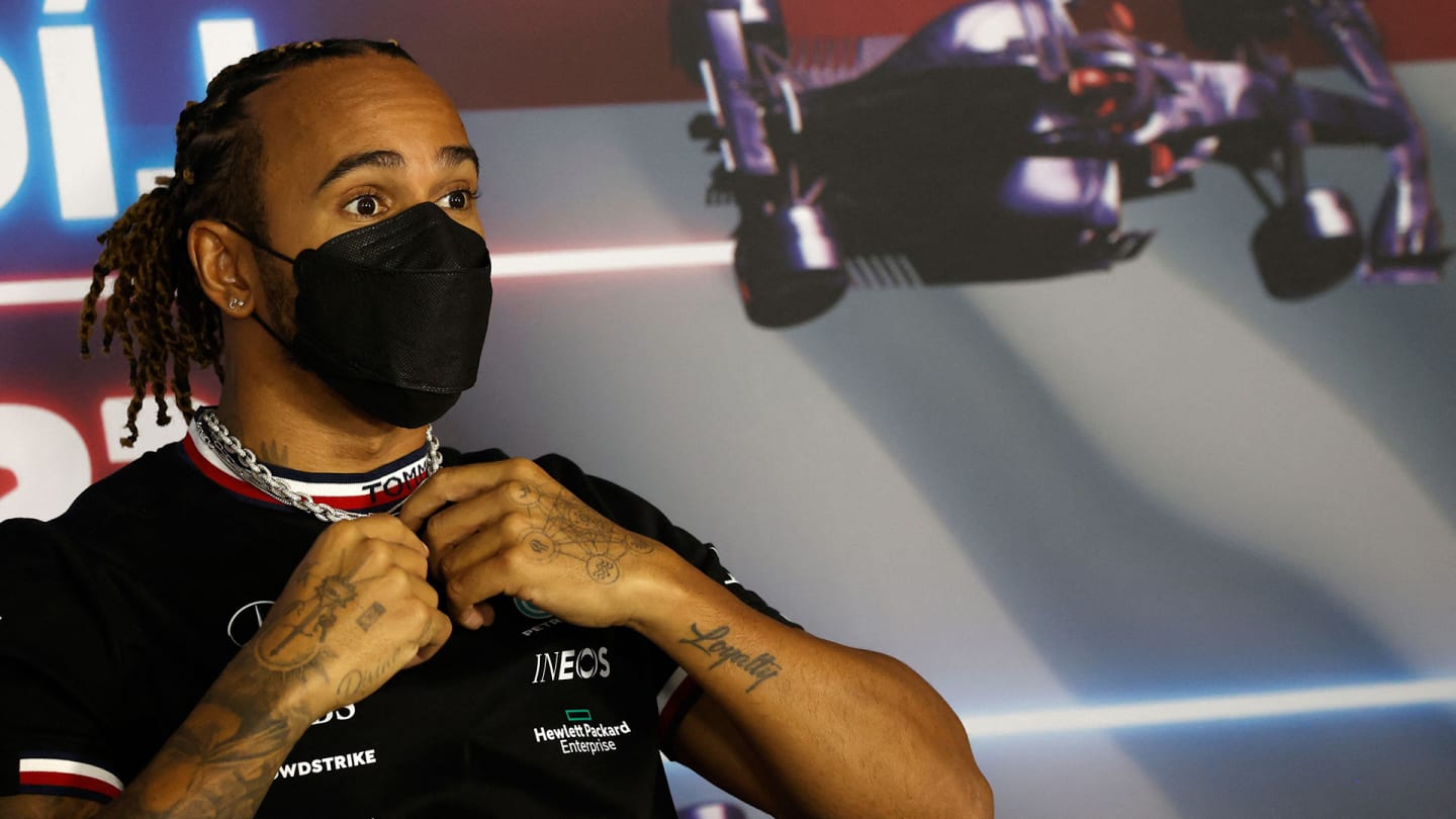 Mercedes' British driver Lewis Hamilton addresses a press conference at the Hungaroring race track