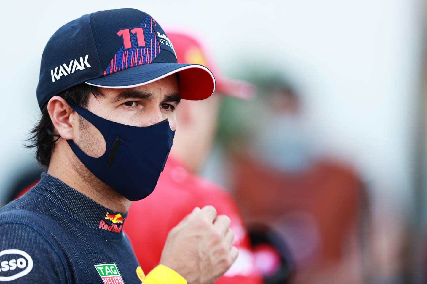 BUDAPEST, HUNGARY - JULY 31: Sergio Perez of Mexico and Red Bull Racing talks to the media in the