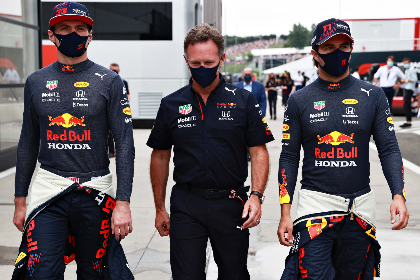 BUDAPEST, HUNGARY - AUGUST 01: Red Bull Racing Team Principal Christian Horner talks with Max