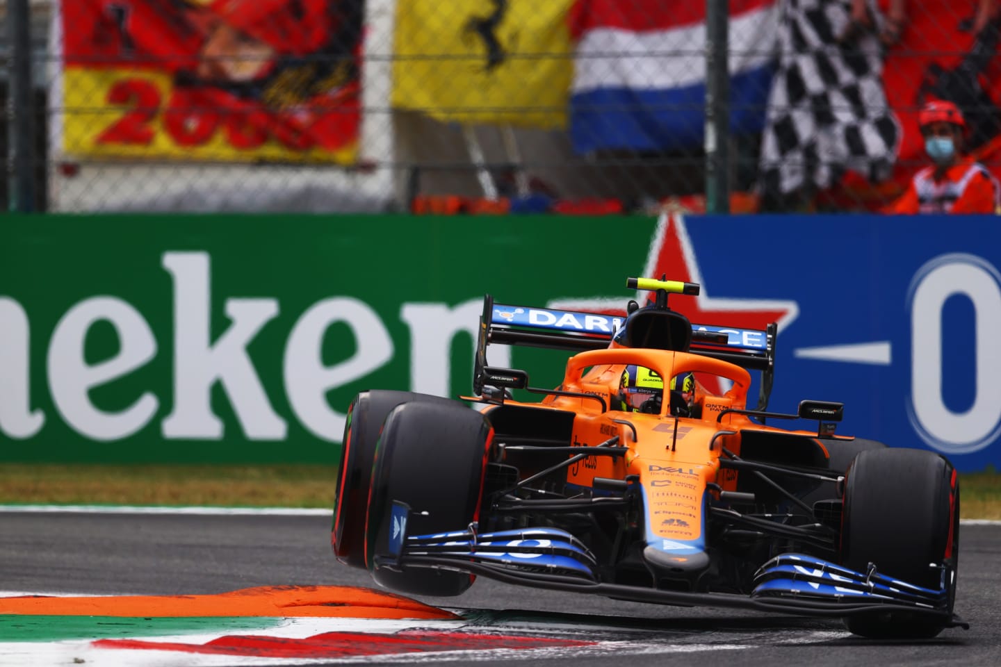 MONZA, ITALY - SEPTEMBER 10: Lando Norris of Great Britain driving the (4) McLaren F1 Team MCL35M Mercedes over a kerb during qualifying ahead of the F1 Grand Prix of Italy at Autodromo di Monza on September 10, 2021 in Monza, Italy. (Photo by Dan Istitene - Formula 1/Formula 1 via Getty Images)