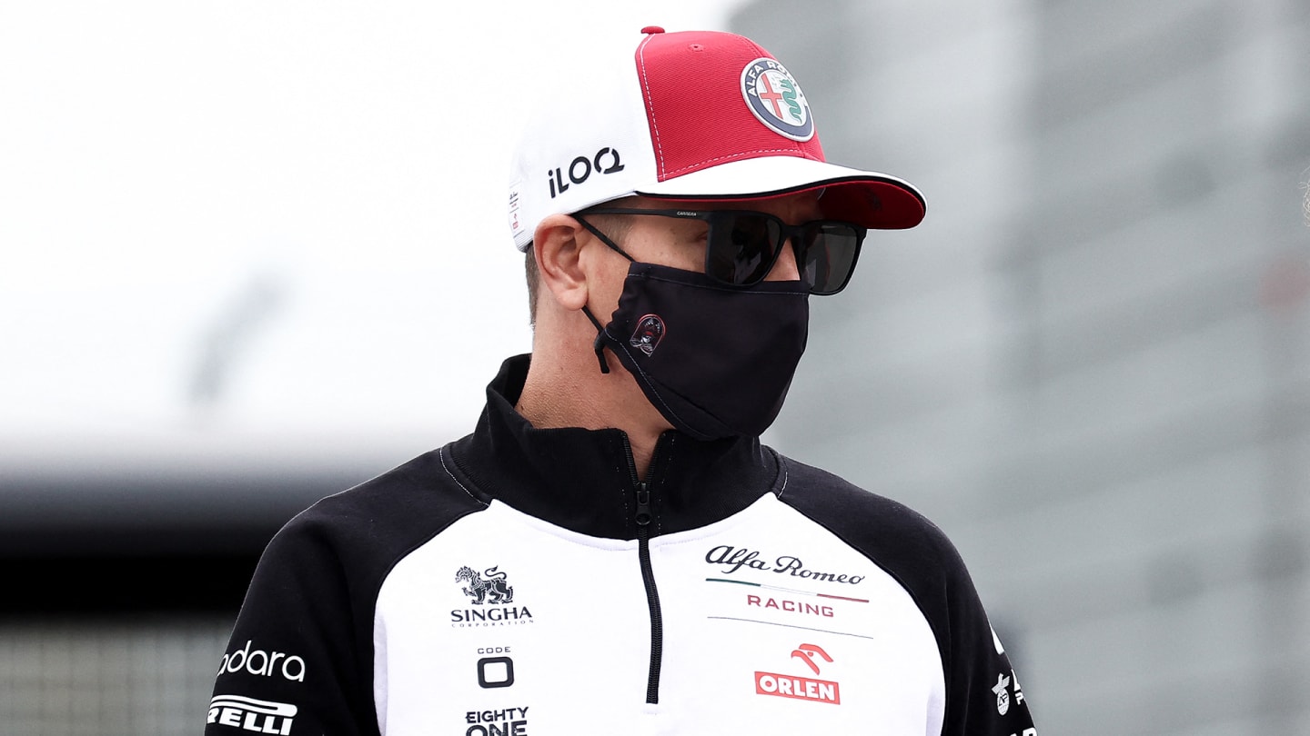 Alfa Romeo's Finnish driver Kimi Raikkonen arrives at the track at Zandvoort on September 2, 2021,