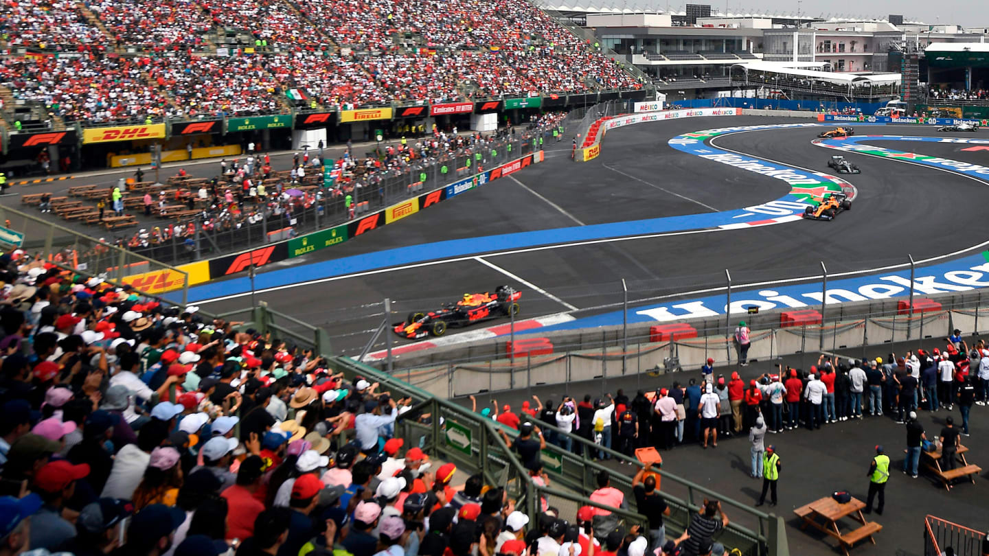Drivers power their racing cars during the F1 Mexico Grand Prix at the Hermanos Rodriguez racetrack