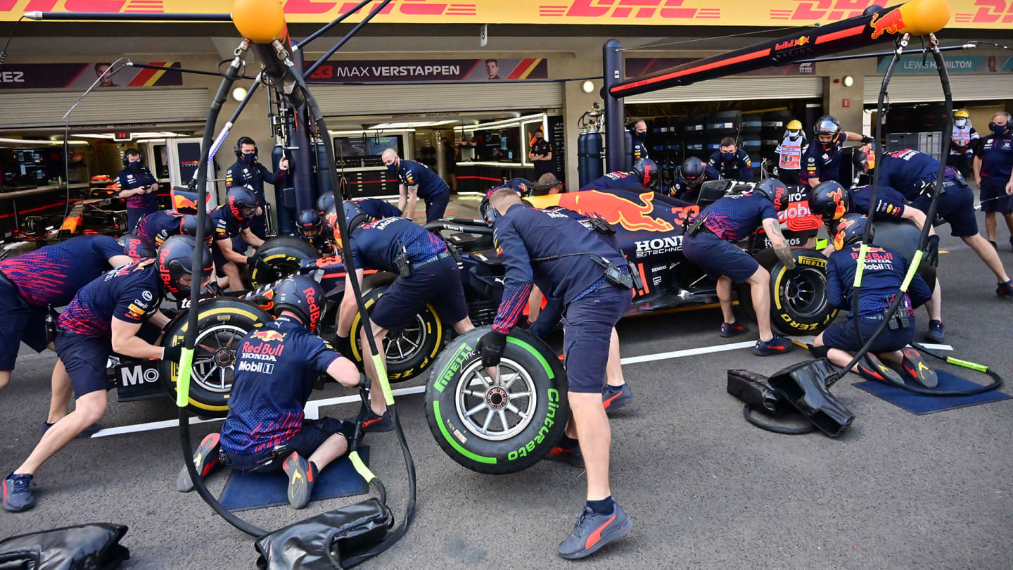 Red Bull's Dutch driver Max Verstappen car is maintained in the pits during the first practice