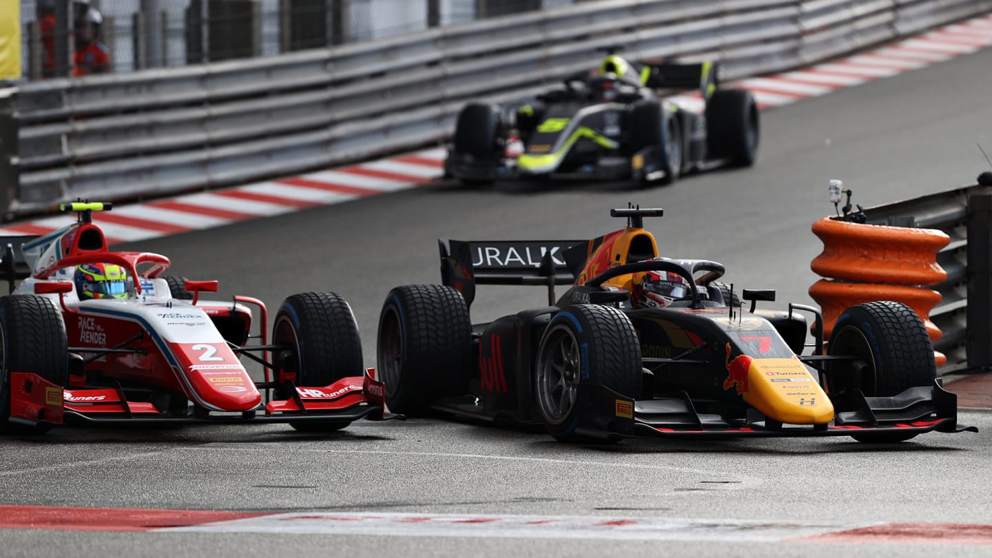 MONTE-CARLO, MONACO - MAY 22: Liam Lawson of New Zealand and Hitech Grand Prix (7) overtakes Oscar