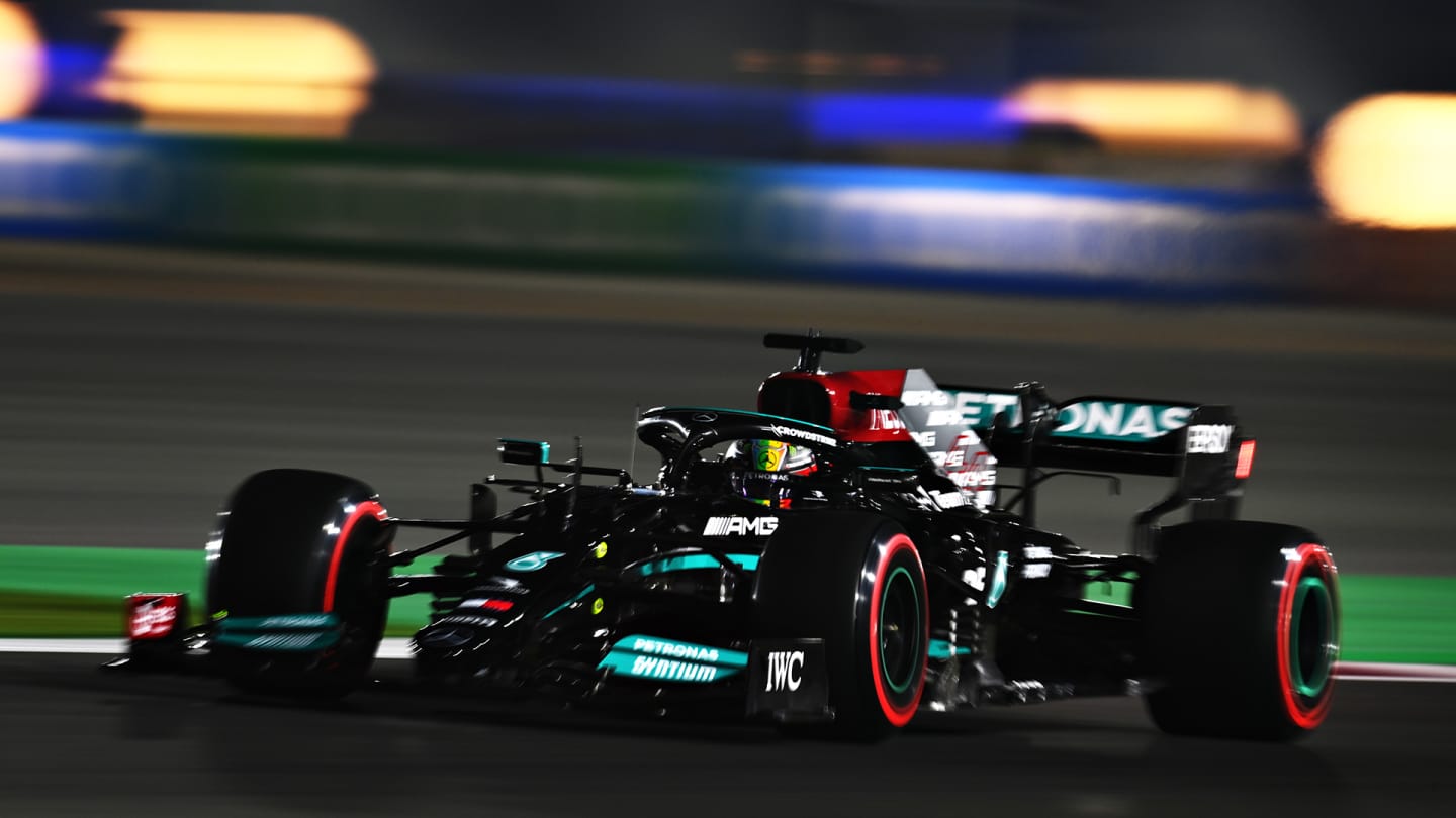 DOHA, QATAR - NOVEMBER 20: Lewis Hamilton of Great Britain driving the (44) Mercedes AMG Petronas F1 Team Mercedes W12 during qualifying ahead of the F1 Grand Prix of Qatar at Losail International Circuit on November 20, 2021 in Doha, Qatar. (Photo by Clive Mason/Getty Images)

