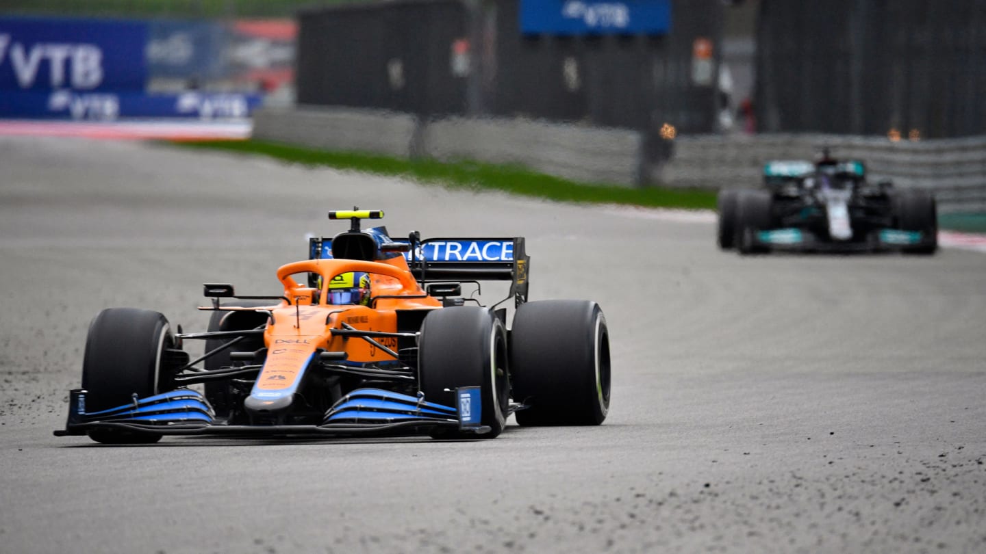 McLaren's British driver Lando Norris leads ahead Mercedes' British driver Lewis Hamilton during