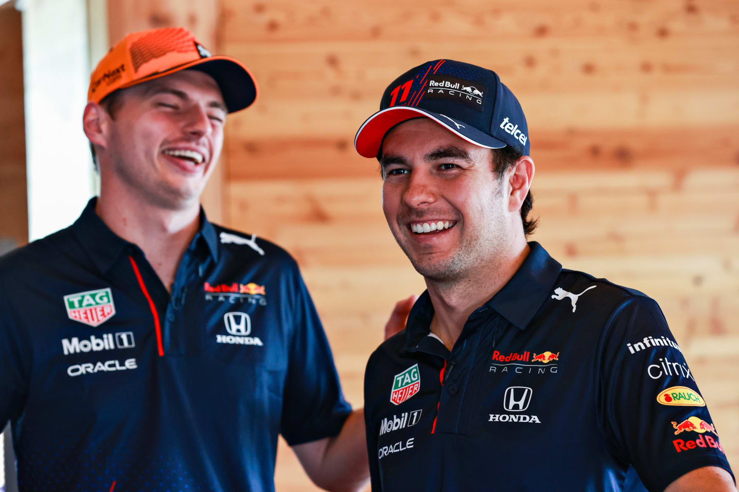 SPIELBERG, AUSTRIA - JUNE 24: Max Verstappen of Netherlands and Red Bull Racing and Sergio Perez of