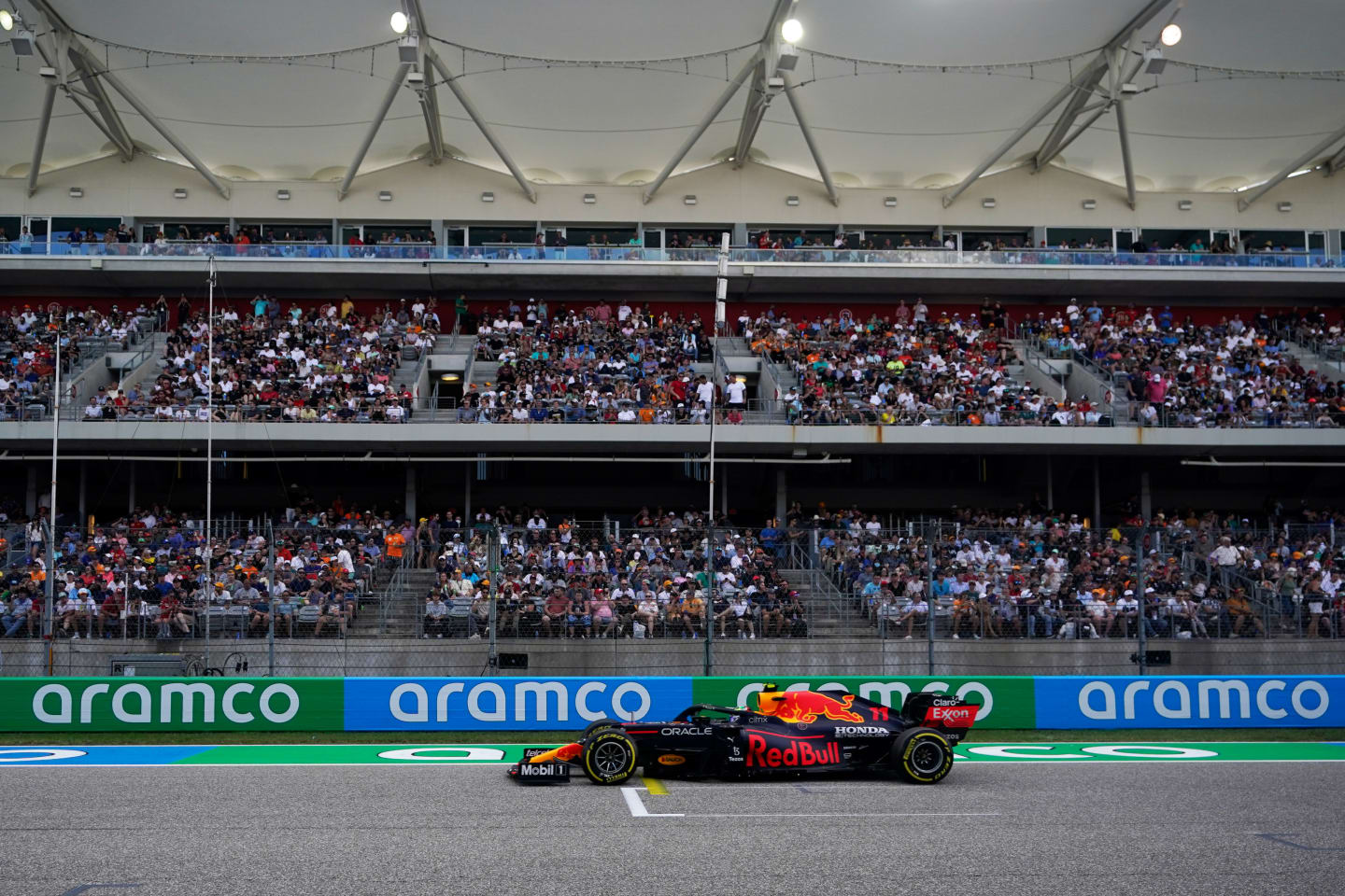 AUSTIN, TEXAS - OCTOBER 23: Sergio Perez of Mexico driving the (11) Red Bull Racing RB16B Honda