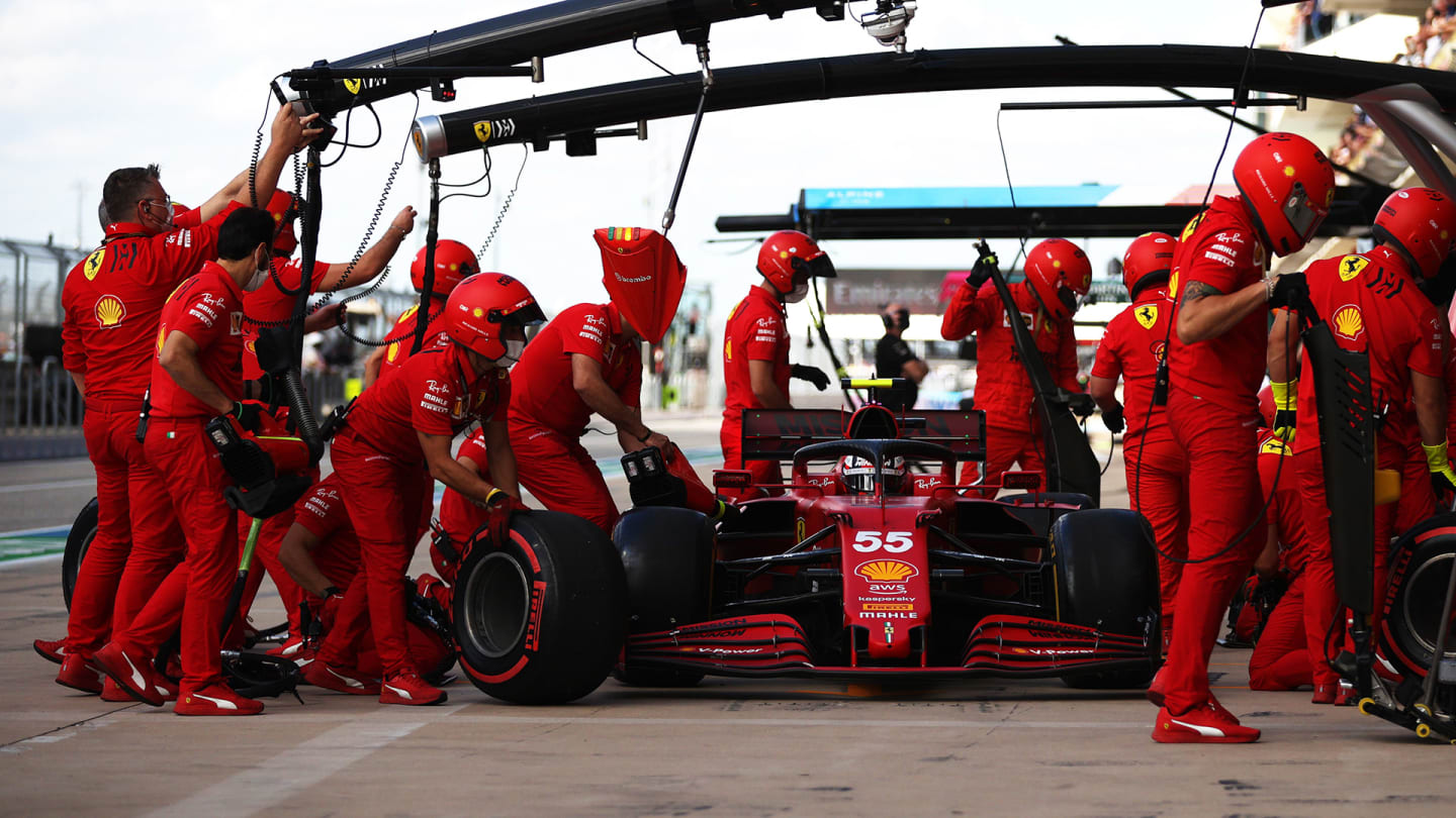 AUSTIN, TEXAS - OCTOBER 23: Carlos Sainz of Spain driving the (55) Scuderia Ferrari SF21 stops in