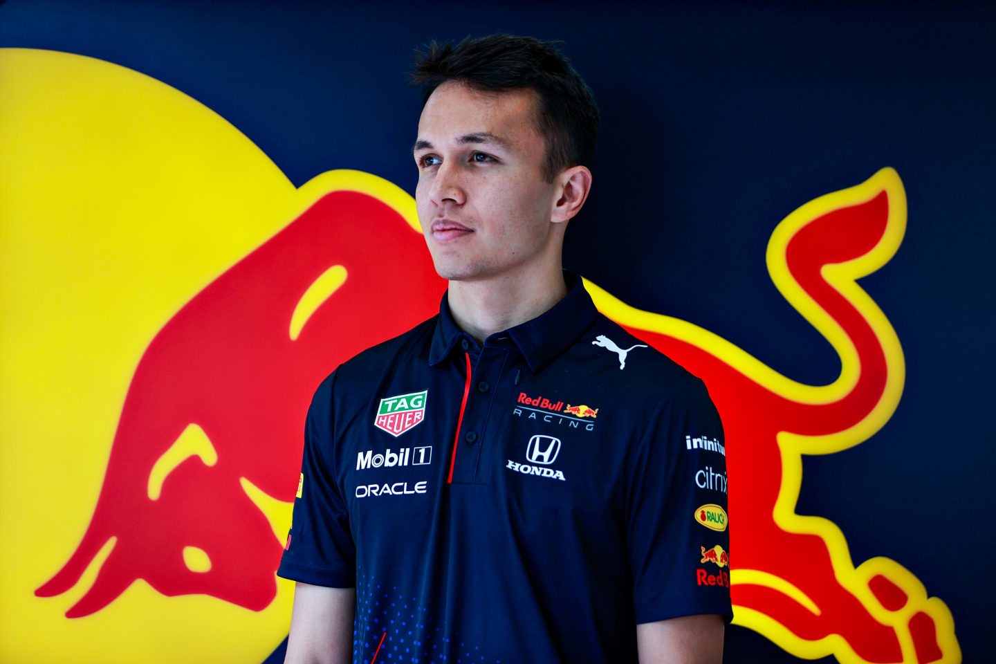 BARCELONA, SPAIN - MAY 07: Alexander Albon of Thailand and Red Bull Racing looks on in the garage
