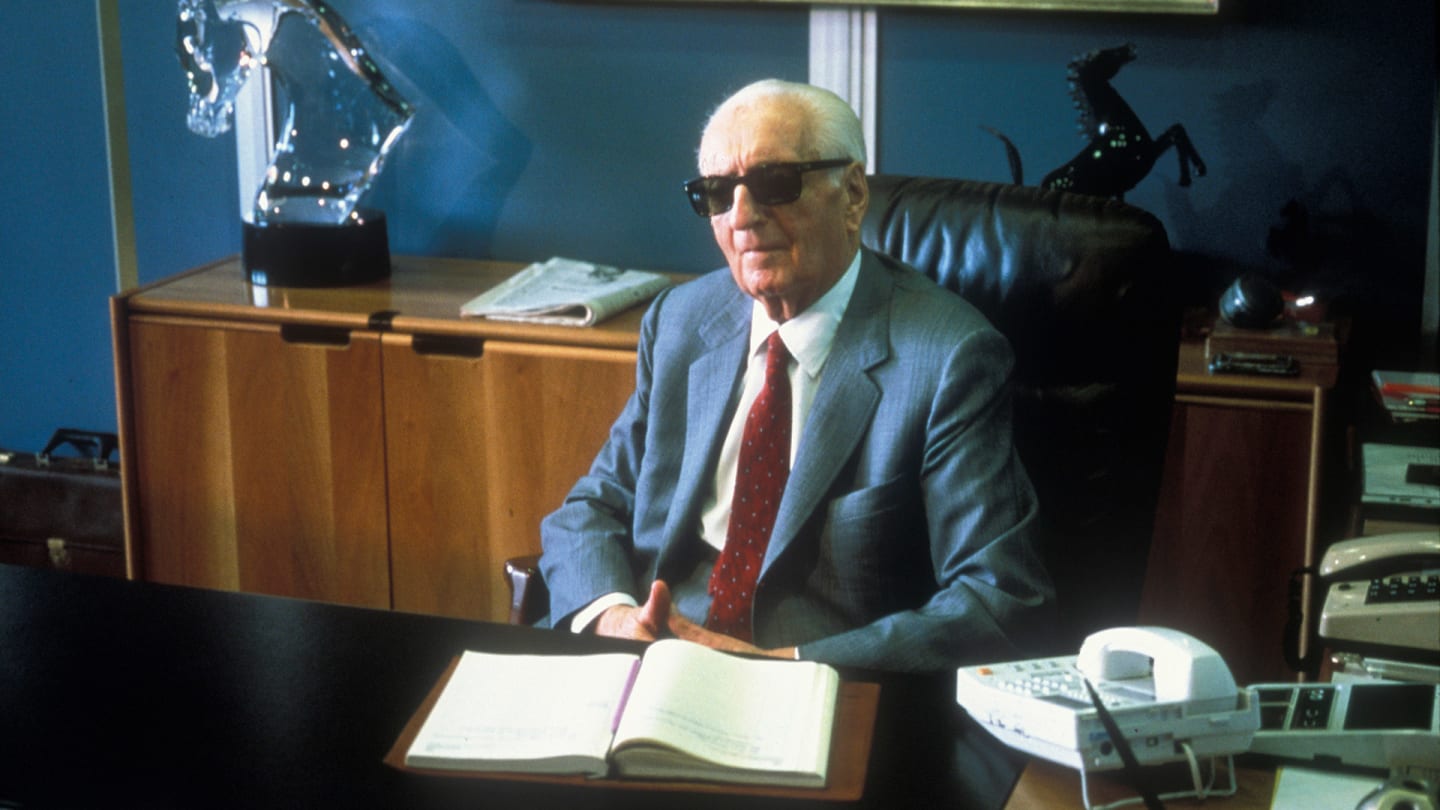 Enzo Ferrari the founder of the Scuderia Ferrari Grand Prix motor racing team sits at his office in