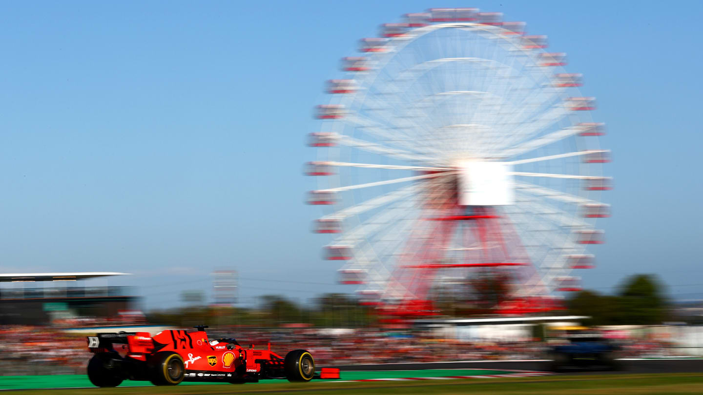 SUZUKA, JAPAN - OCTOBER 13: Sebastian Vettel of Germany driving the (5) Scuderia Ferrari SF90