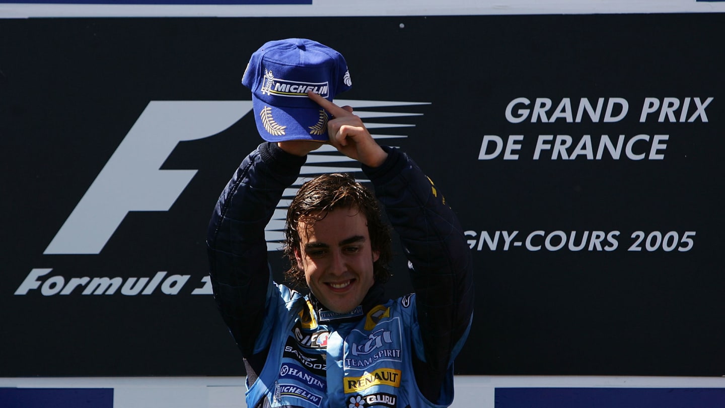 MAGNY COURS, FRANCE - JULY 03:  Fernando Alonso of Spain and Renault celebrate after winning the
