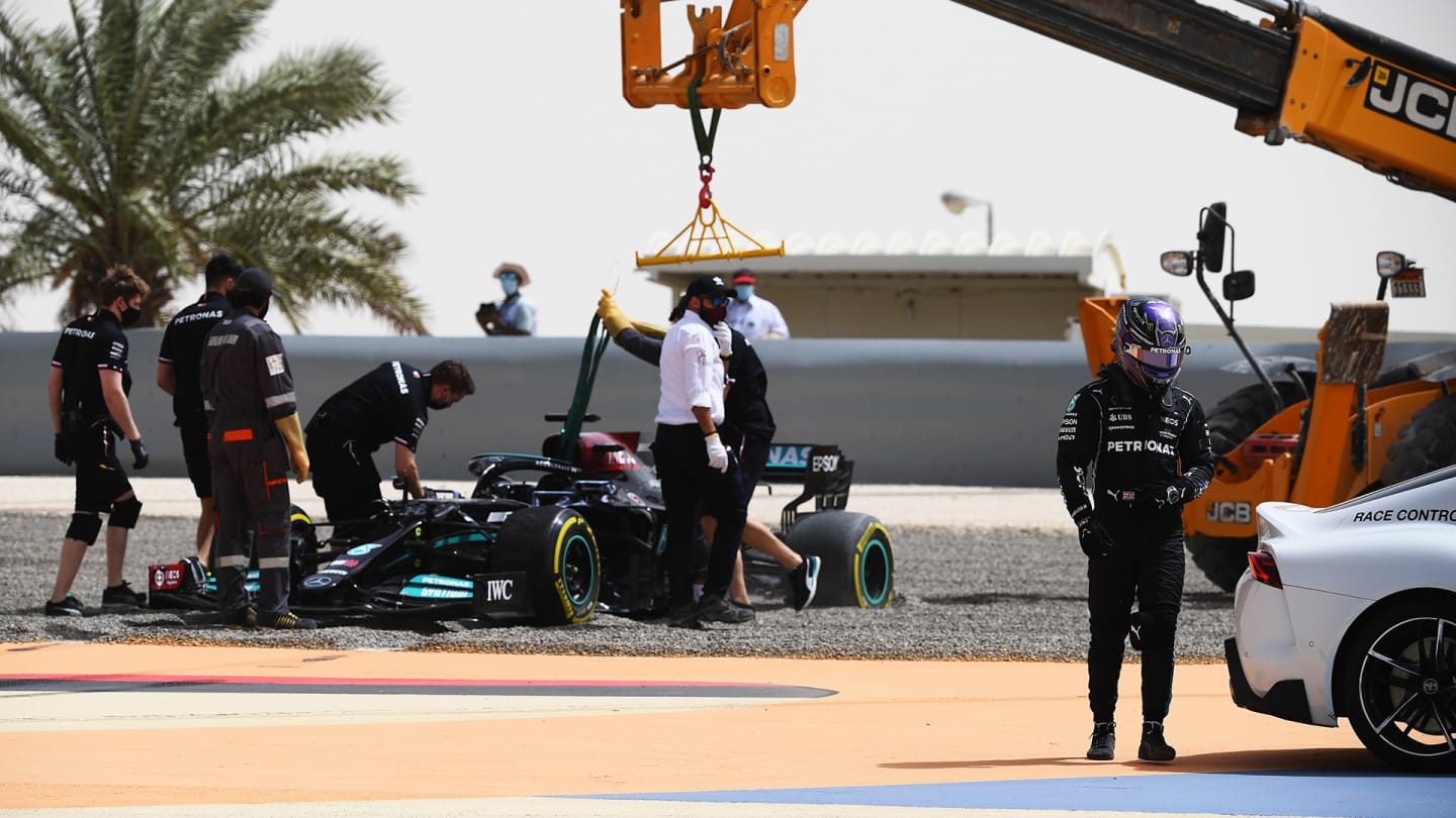 BAHRAIN, BAHRAIN - MARCH 13: Lewis Hamilton of Great Britain and Mercedes GP makes his way to the