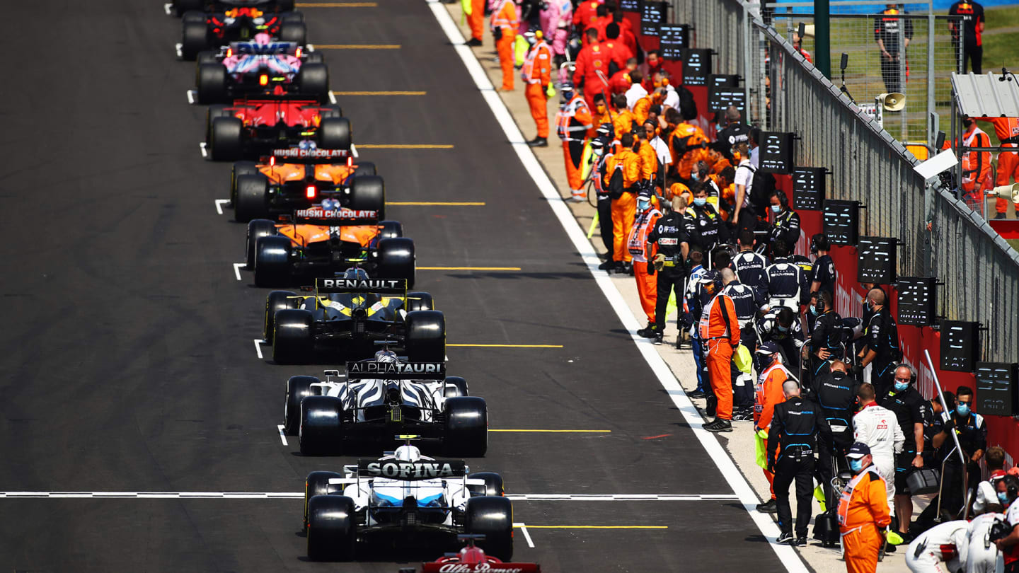 NORTHAMPTON, ENGLAND - AUGUST 09: A general view as the cars line up on the grid before during the