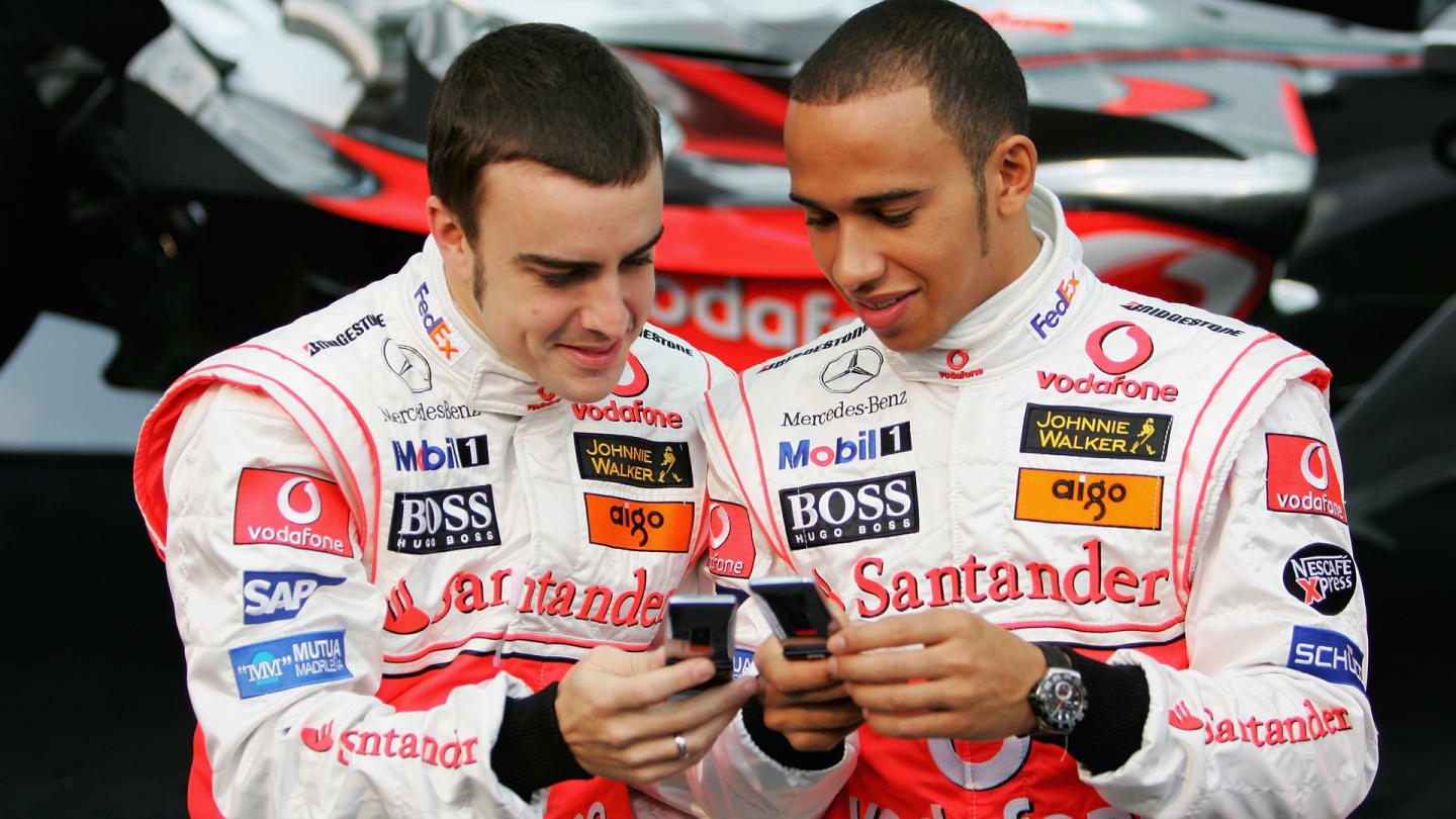VALENCIA, SPAIN - JANUARY 15:  Fernando Alonso of Spain and team-mate Lewis Hamilton of Great