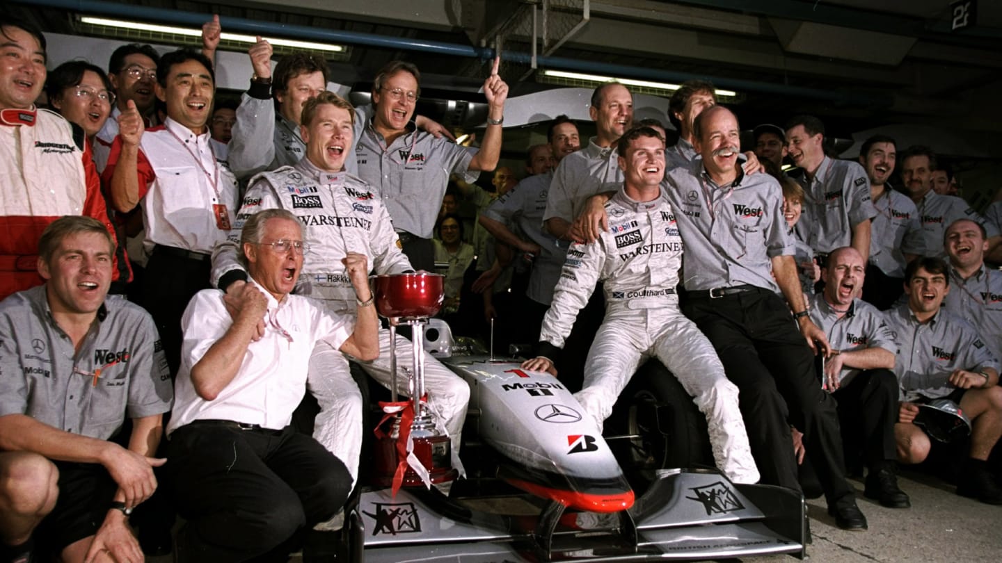 1 Nov 1998:  The McLaren Mercedes team celebrates a winning year after the Japanese Grand Prix at