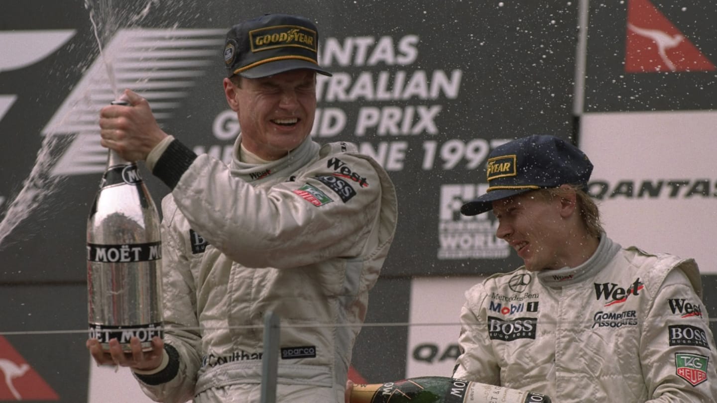 9 Mar 1997:  David Coulthard (left) of Great Britain and Mika Hakkinen of Finland enjoy the spoils