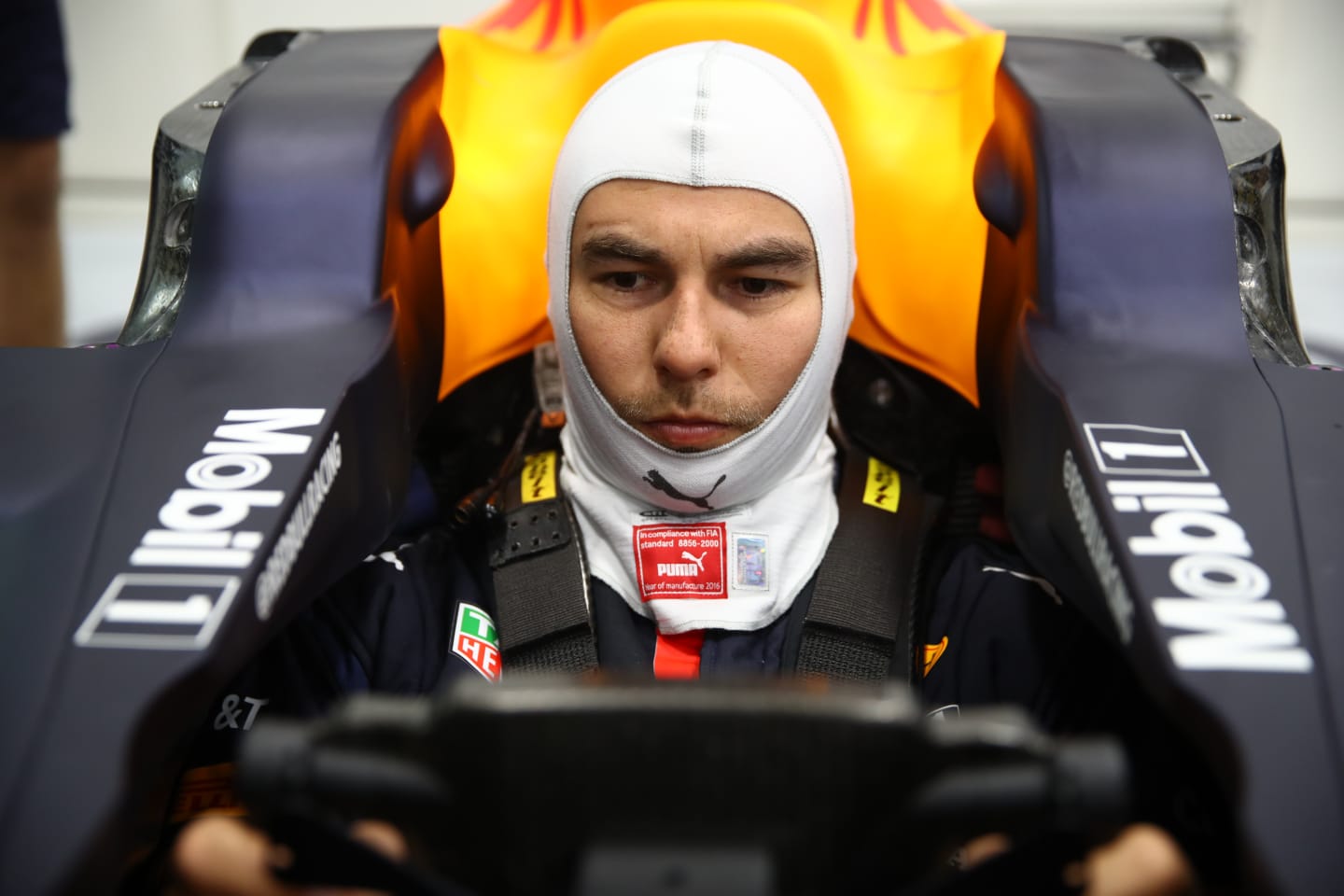 MILTON KEYNES, ENGLAND - JANUARY 12: Sergio Perez of Mexico and Red Bull Racing has a seat fitting