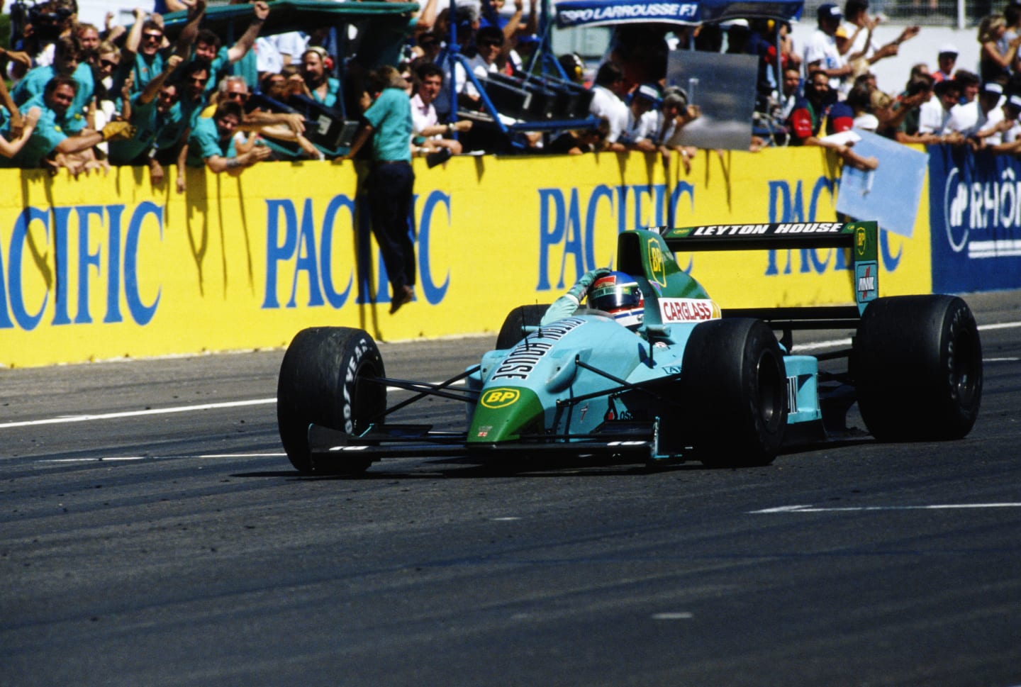 Ivan Capelli driver of the #16 Leyton House Racing Leyton House CG901 Judd celebrates his and the