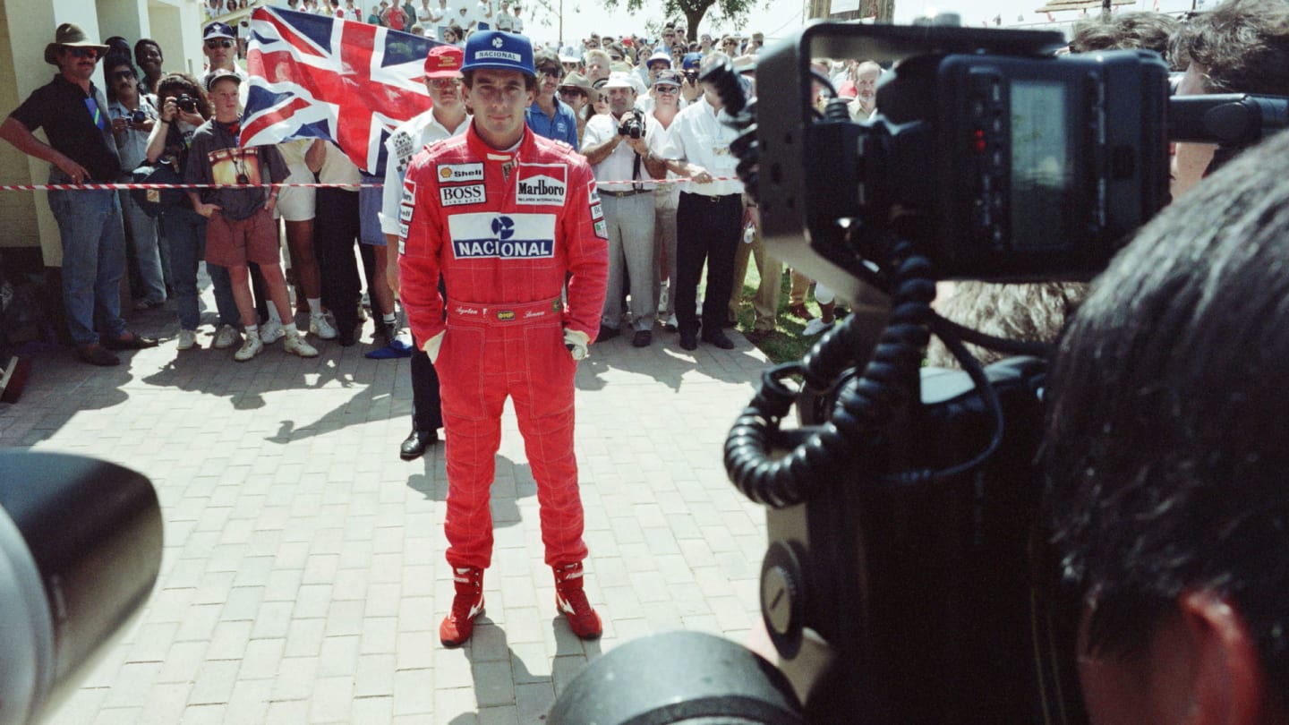 Brazilian driver Ayrton Senna is framed by cameras prior the start of the South African Formula One