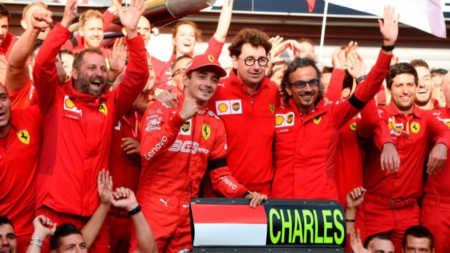 TOPSHOT - Winner Ferrari's Monegasque driver Charles Leclerc (C-L) and Ferrari's team principal