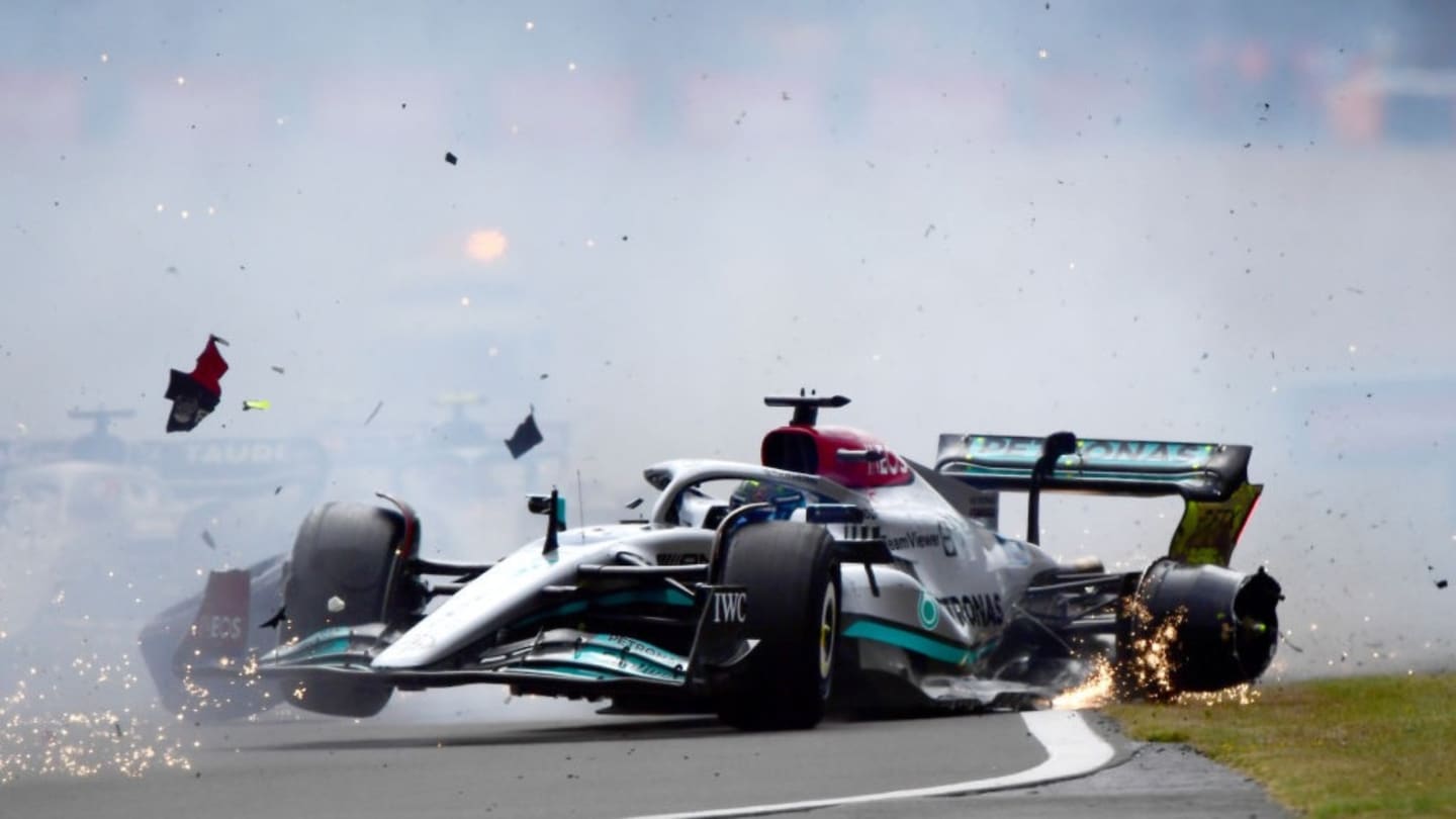 NORTHAMPTON, ENGLAND - JULY 03: George Russell of Great Britain driving the (63) Mercedes AMG Petronas F1 Team W13 crashes at the start during the F1 Grand Prix of Great Britain at Silverstone on July 03, 2022 in Northampton, England. (Photo by Mario Renzi - Formula 1/Formula 1 via Getty Images)

