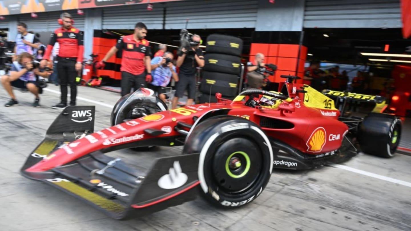 Ferrari's Monegasque driver Charles Leclerc steers his car in the pit lane during the first