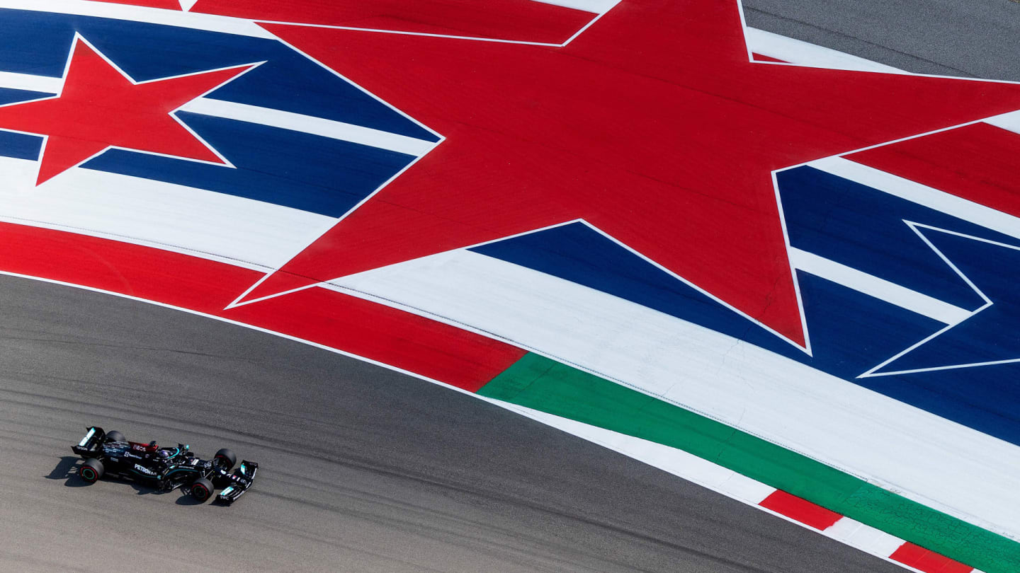 Mercedes' British driver Lewis Hamilton races during the first practice session at the Circuit of