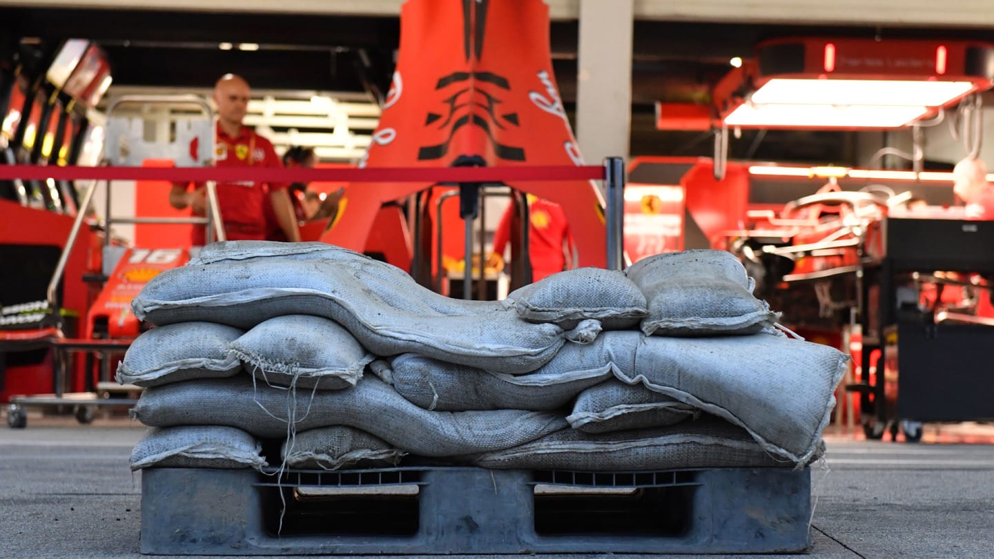 Sandbags outside an F1 garage